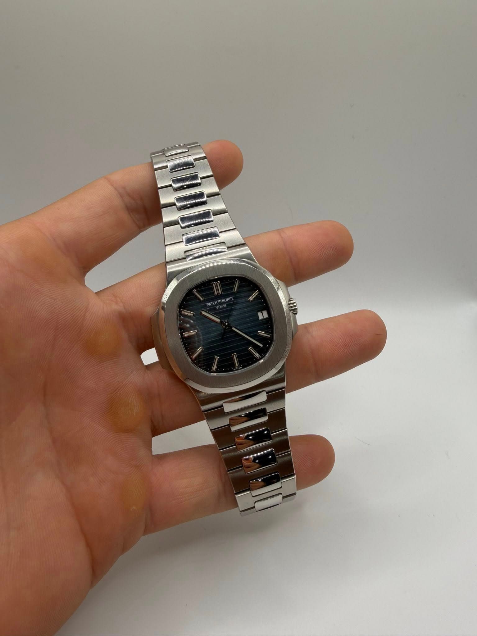 May be an image of wrist watch