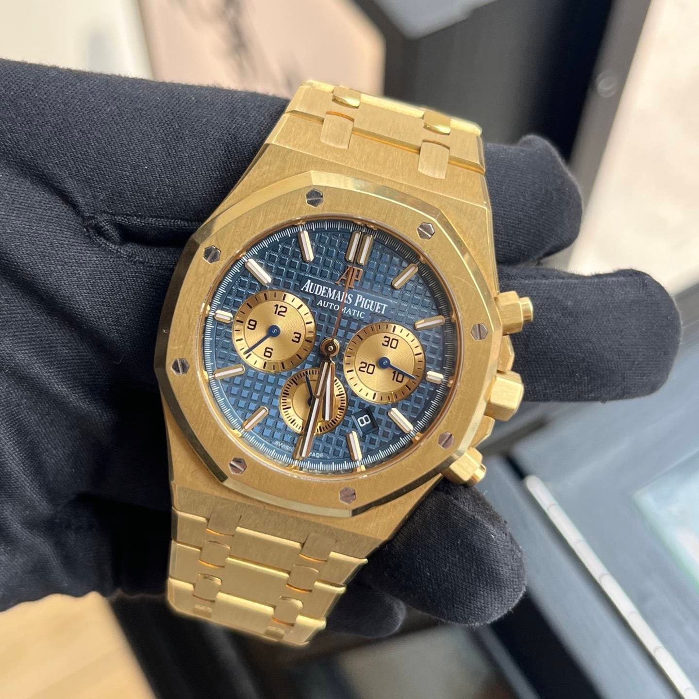May be an image of wrist watch and text