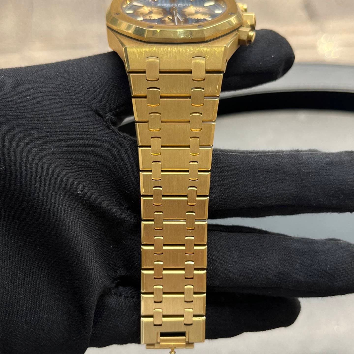 May be an image of wrist watch and text