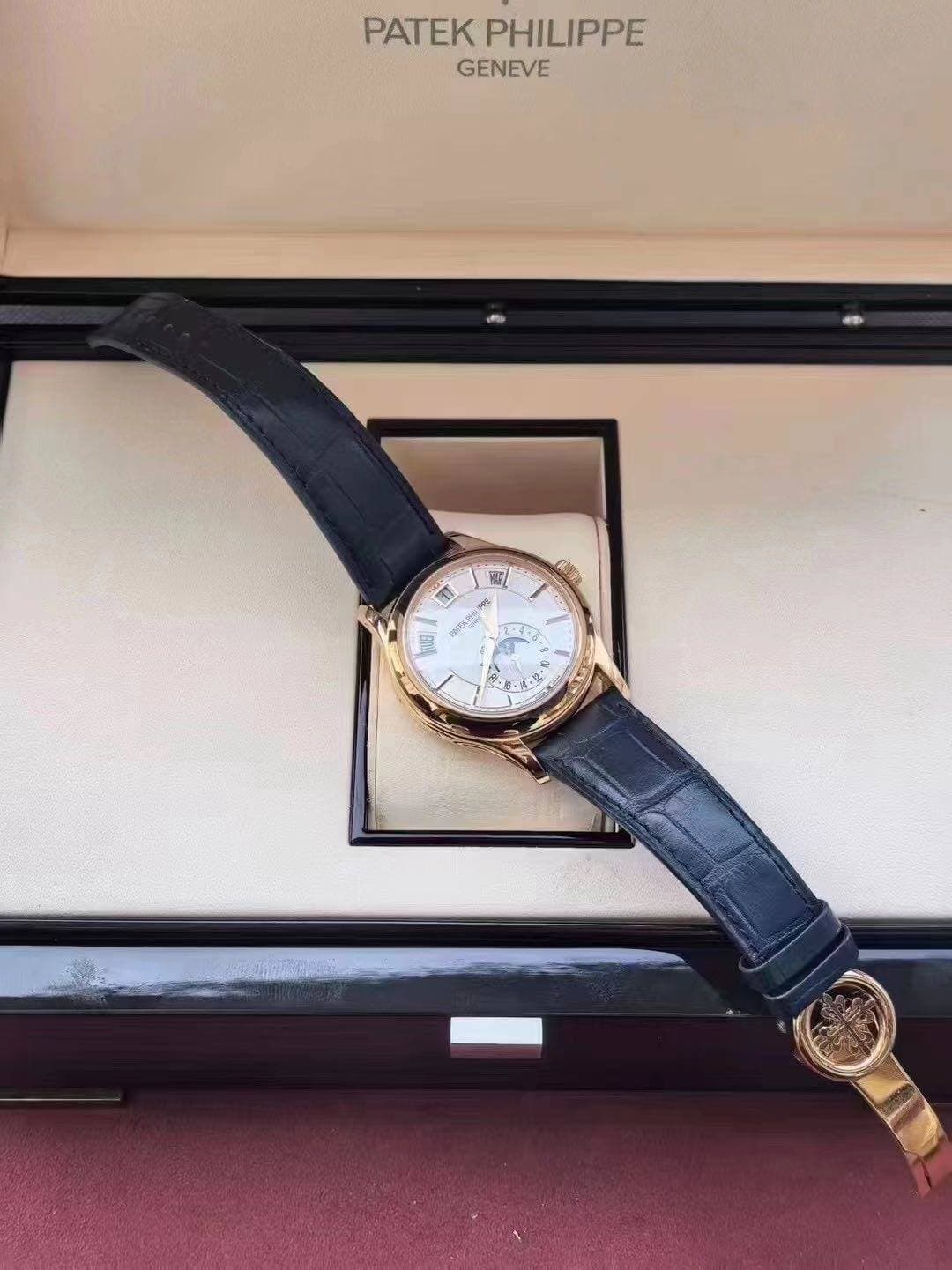 May be an image of wrist watch and text