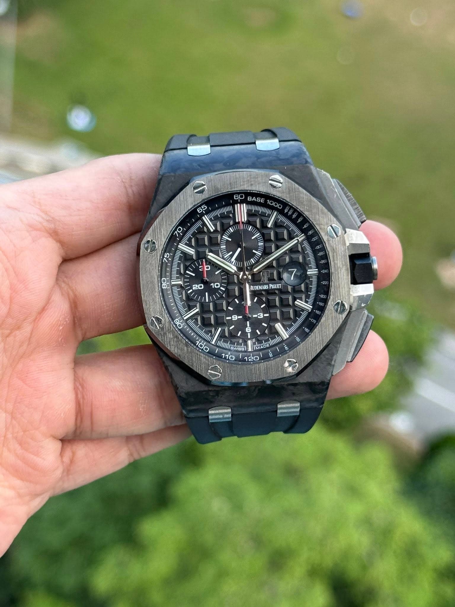 May be an image of wrist watch and text
