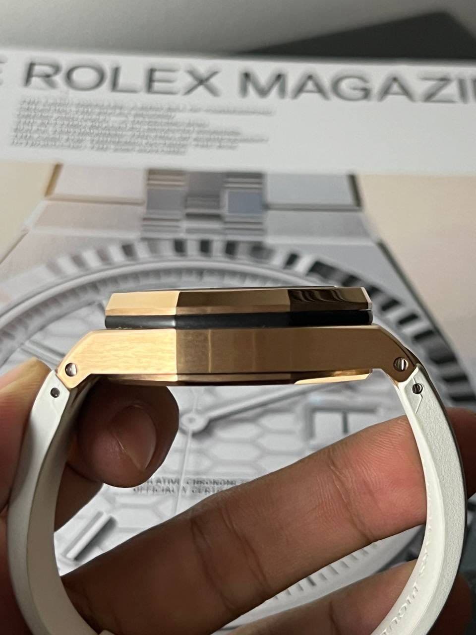 May be an image of wrist watch and text