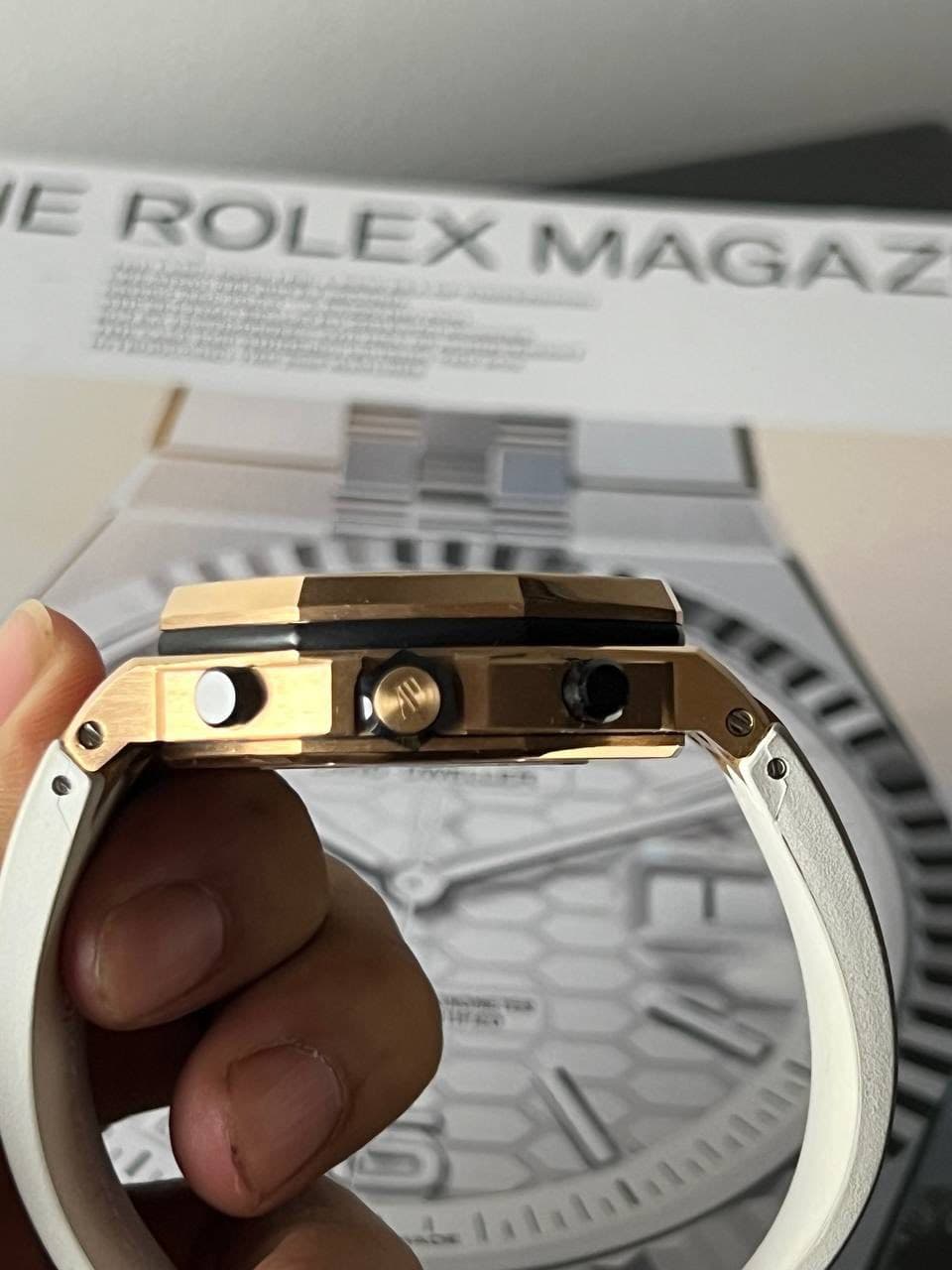 May be an image of wrist watch and text