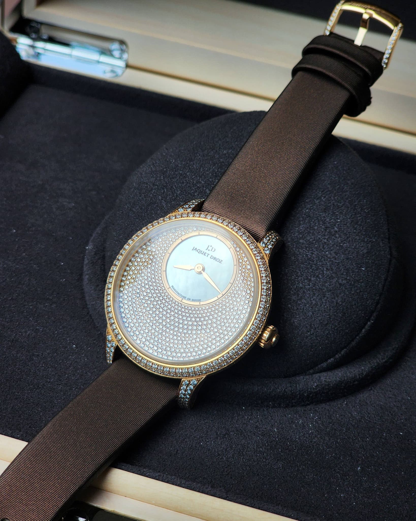 May be an image of wrist watch and text