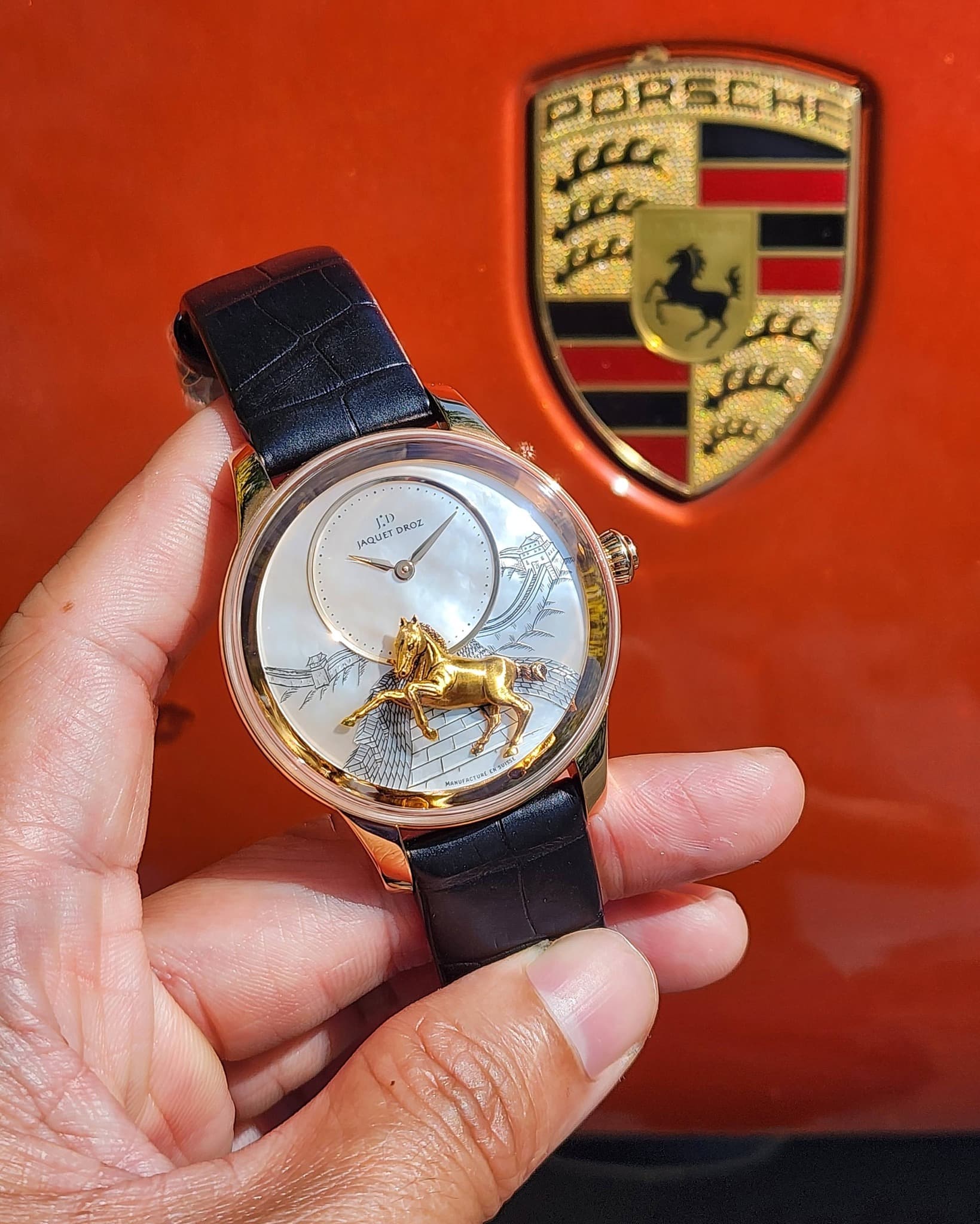 May be an image of wrist watch and text
