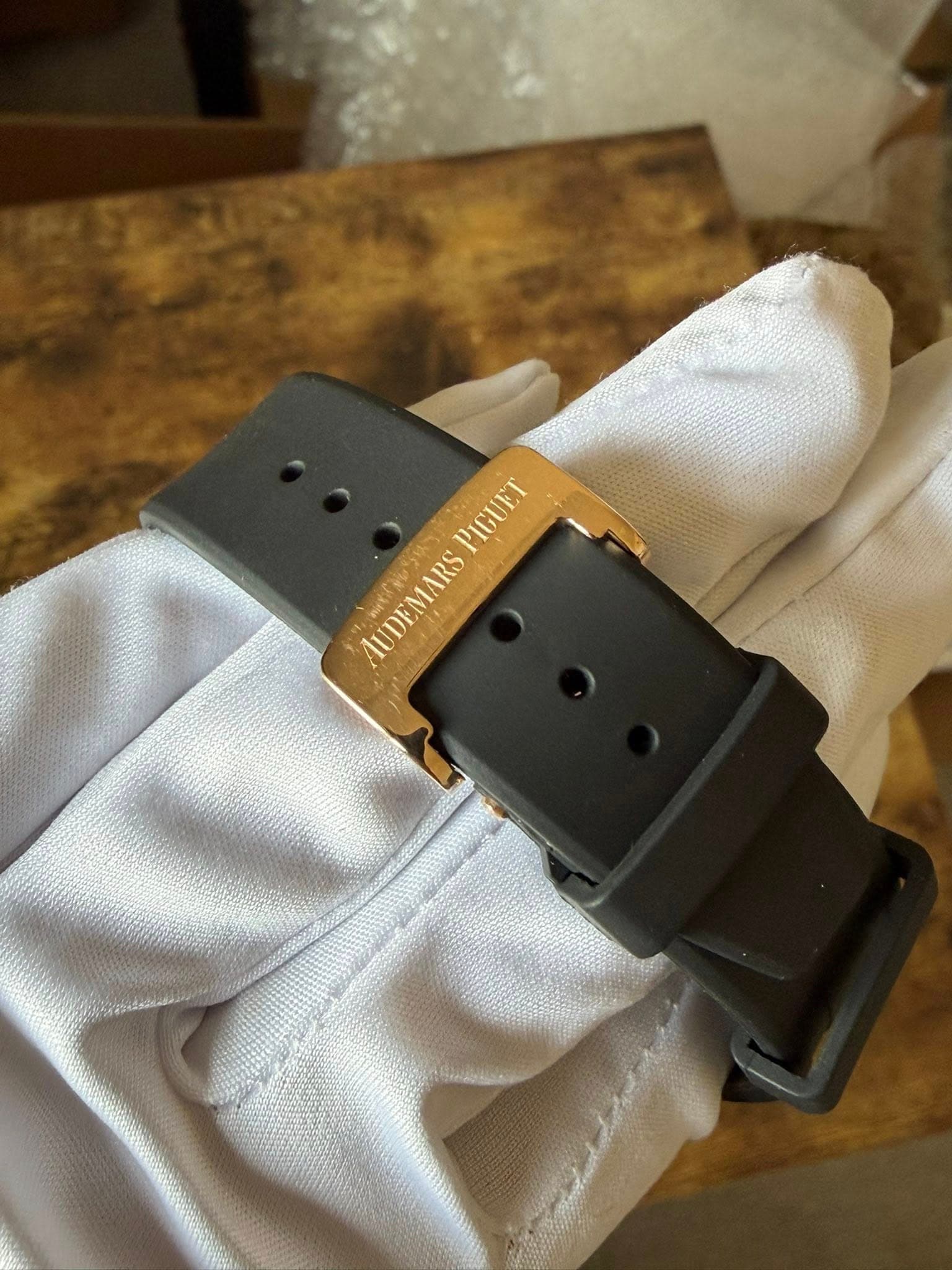 May be an image of leather, saddle-stitched leather, wrist watch and text that says 'PIGUET PIGUET AUDEMARS'
