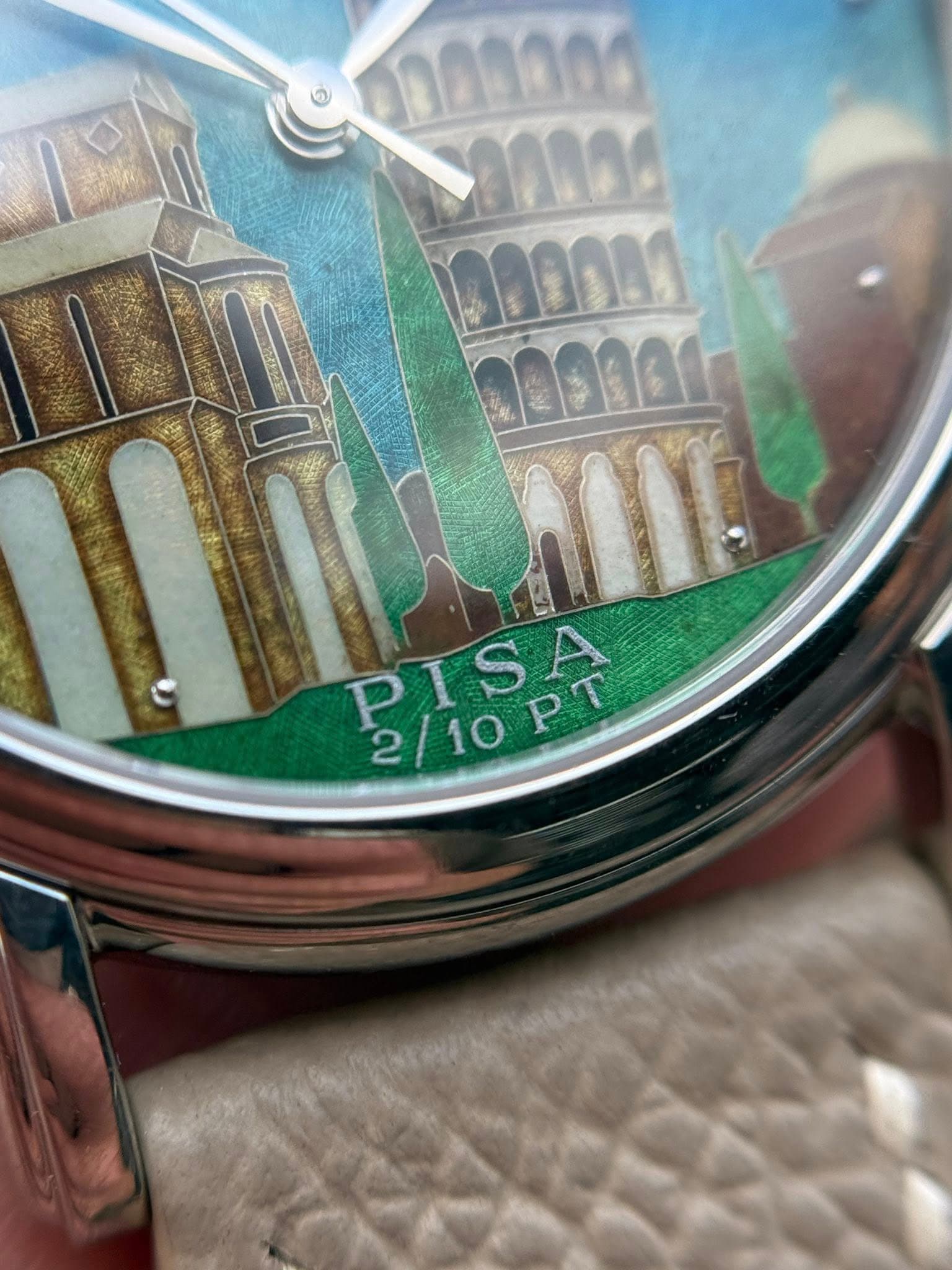May be an image of wrist watch and text