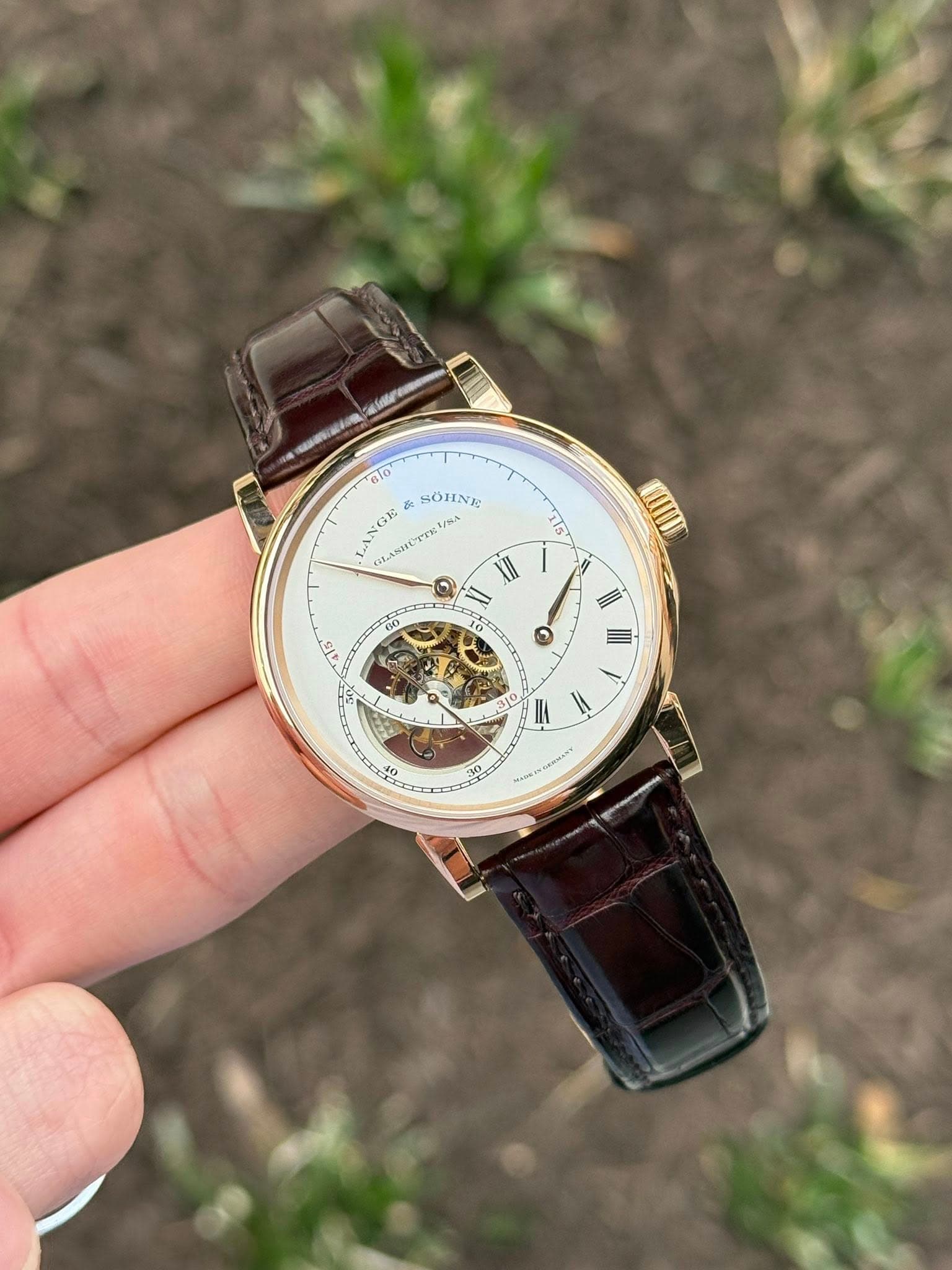 May be an image of wrist watch and text