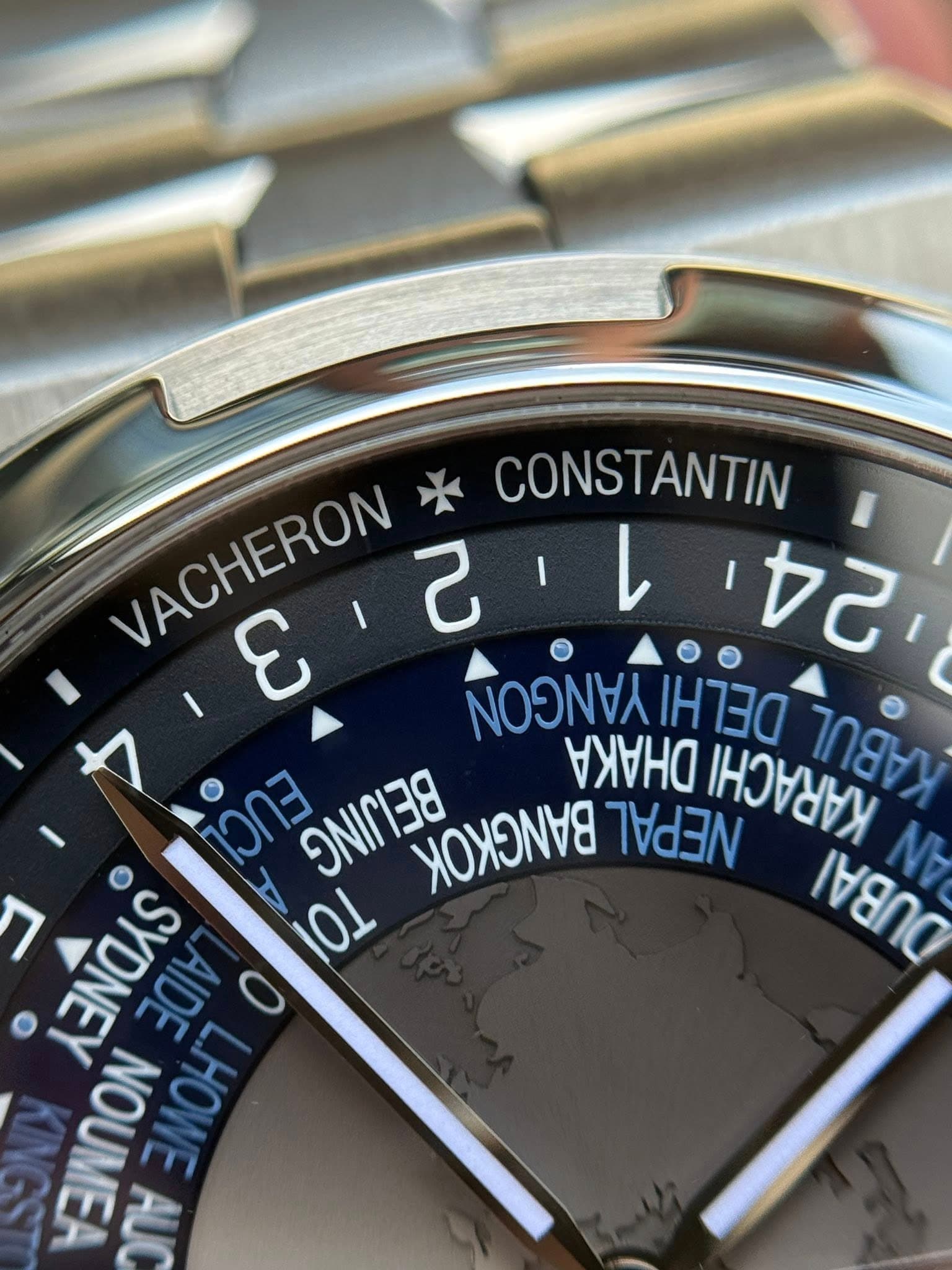 May be an image of wrist watch and text