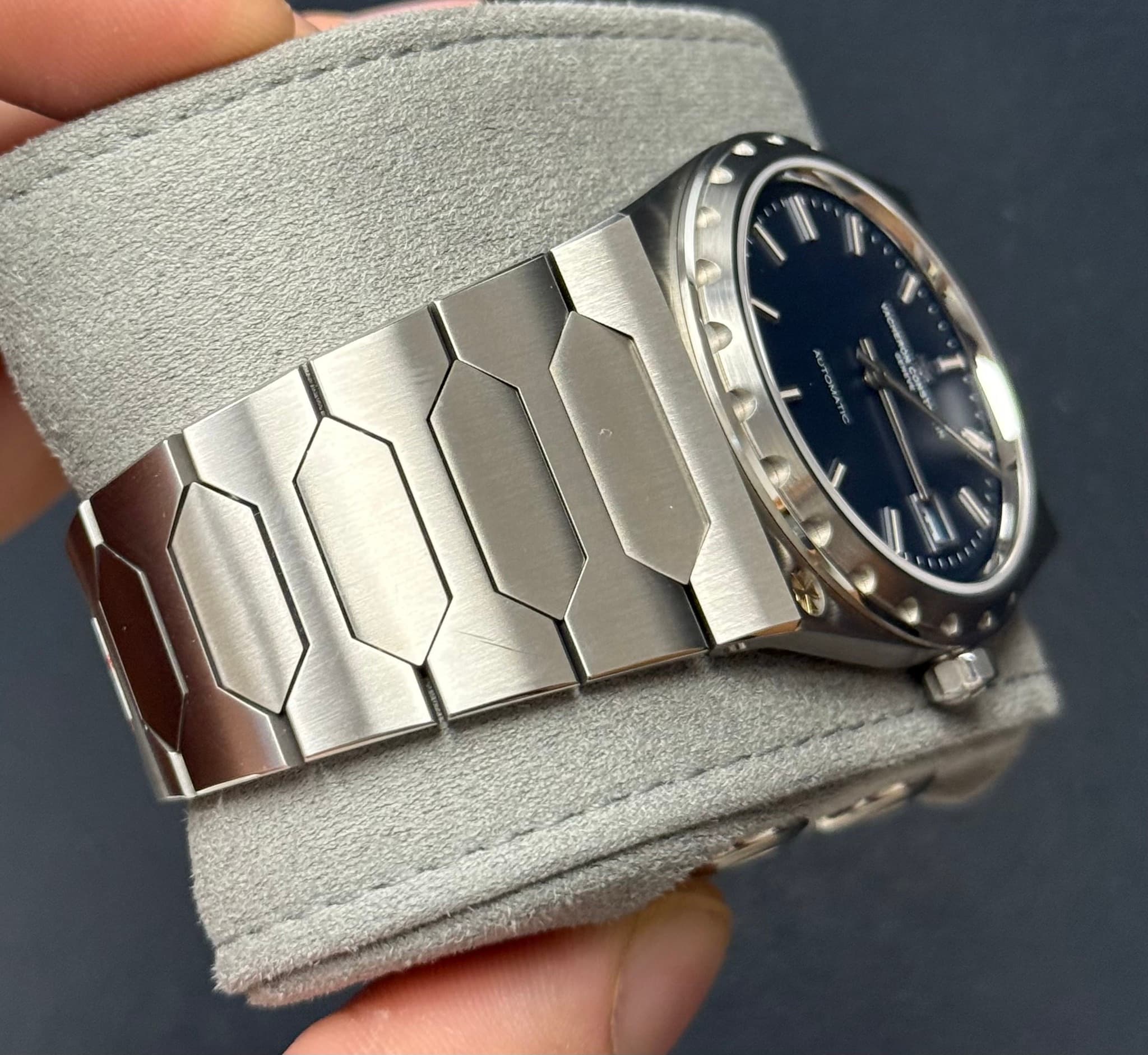 May be an image of wrist watch and text
