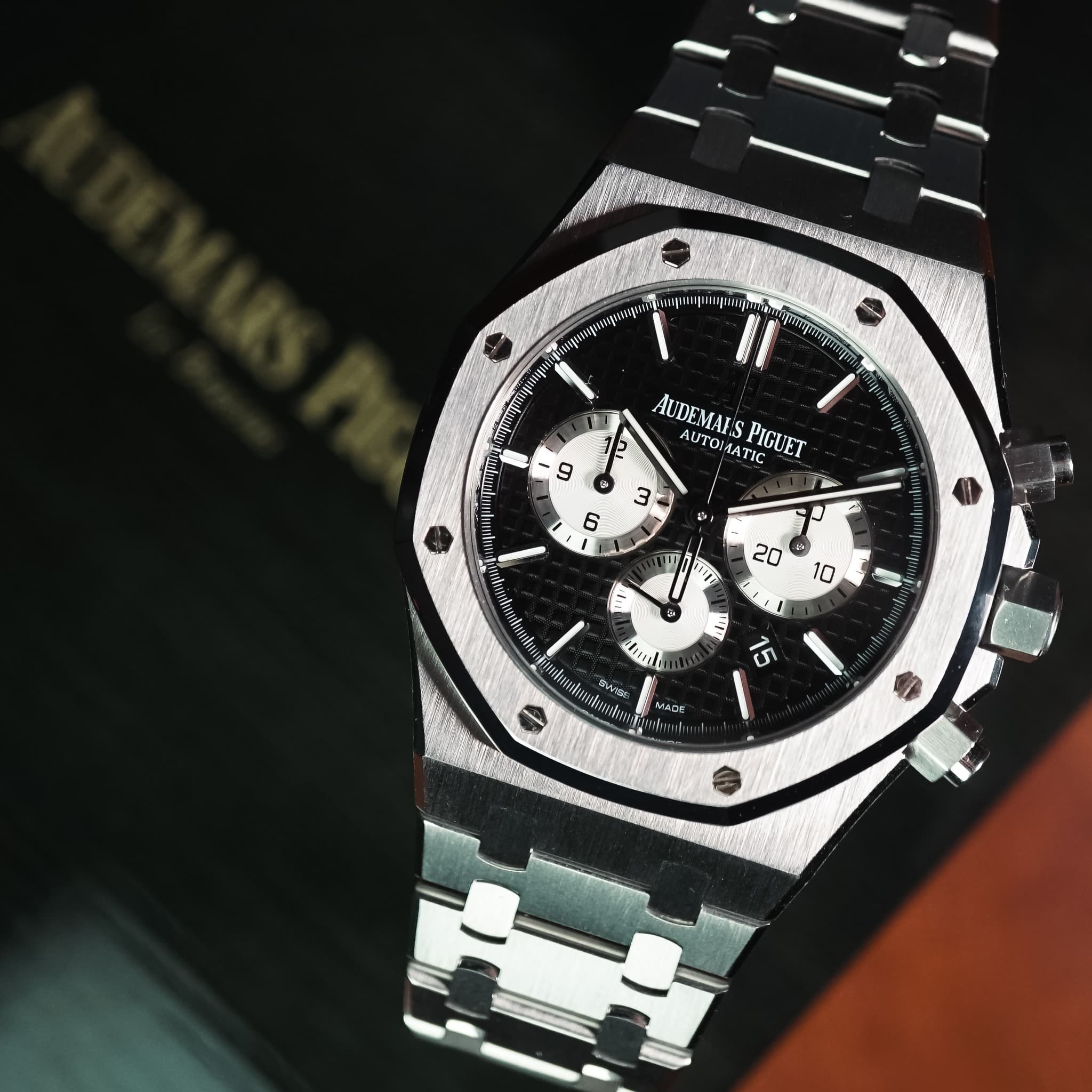 May be an image of wrist watch and text