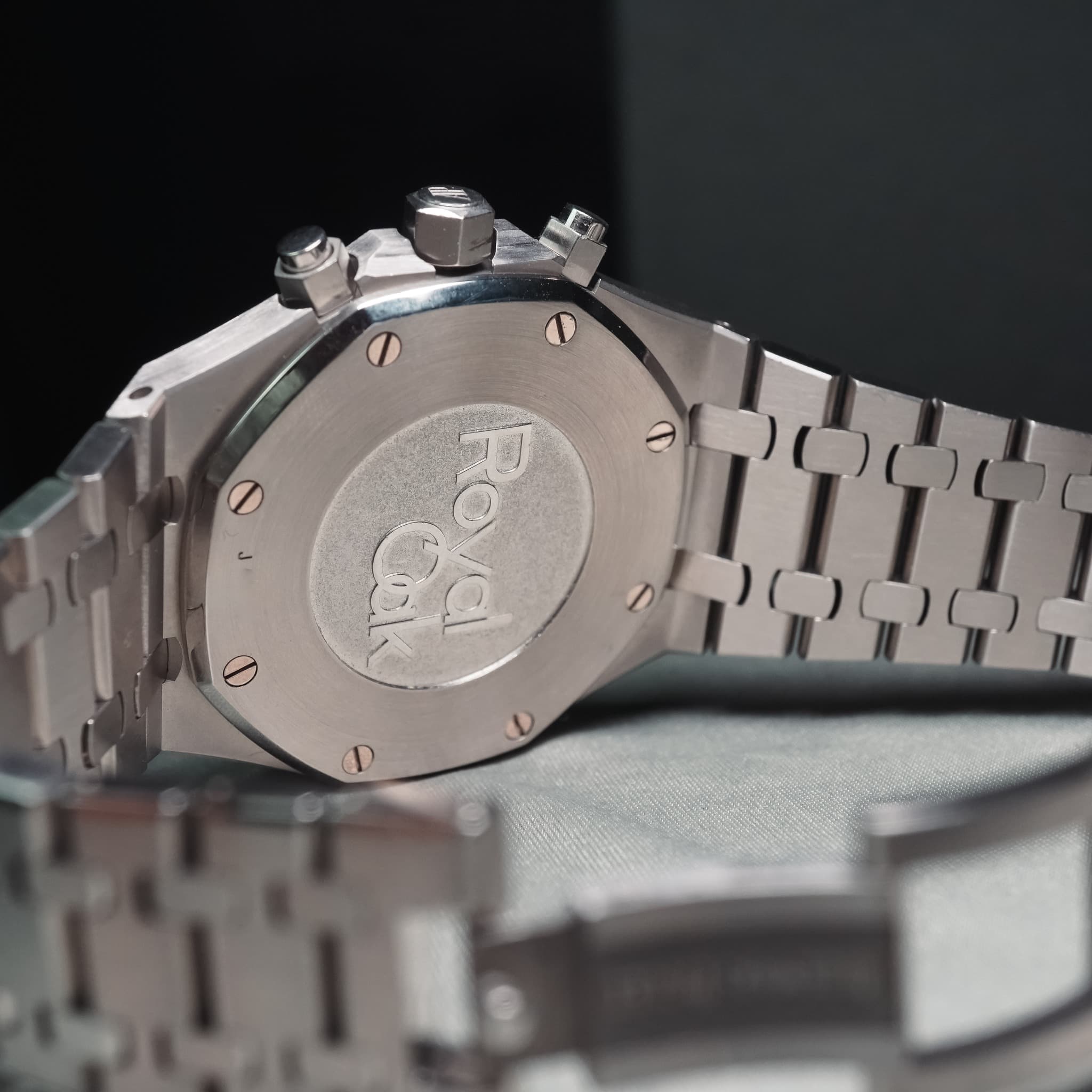May be an image of wrist watch and text