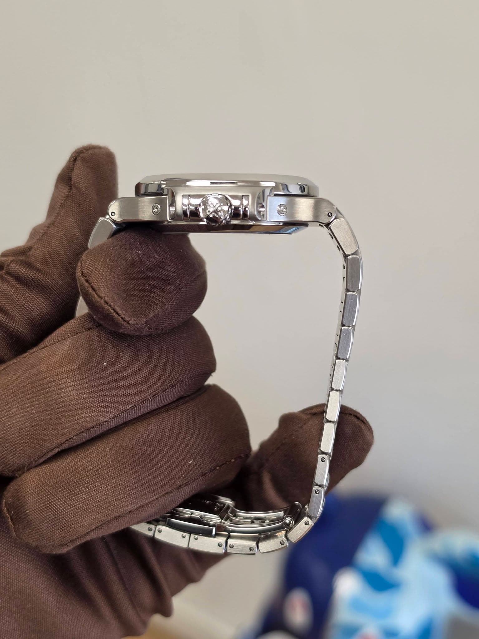 May be an image of wrist watch and jewelry