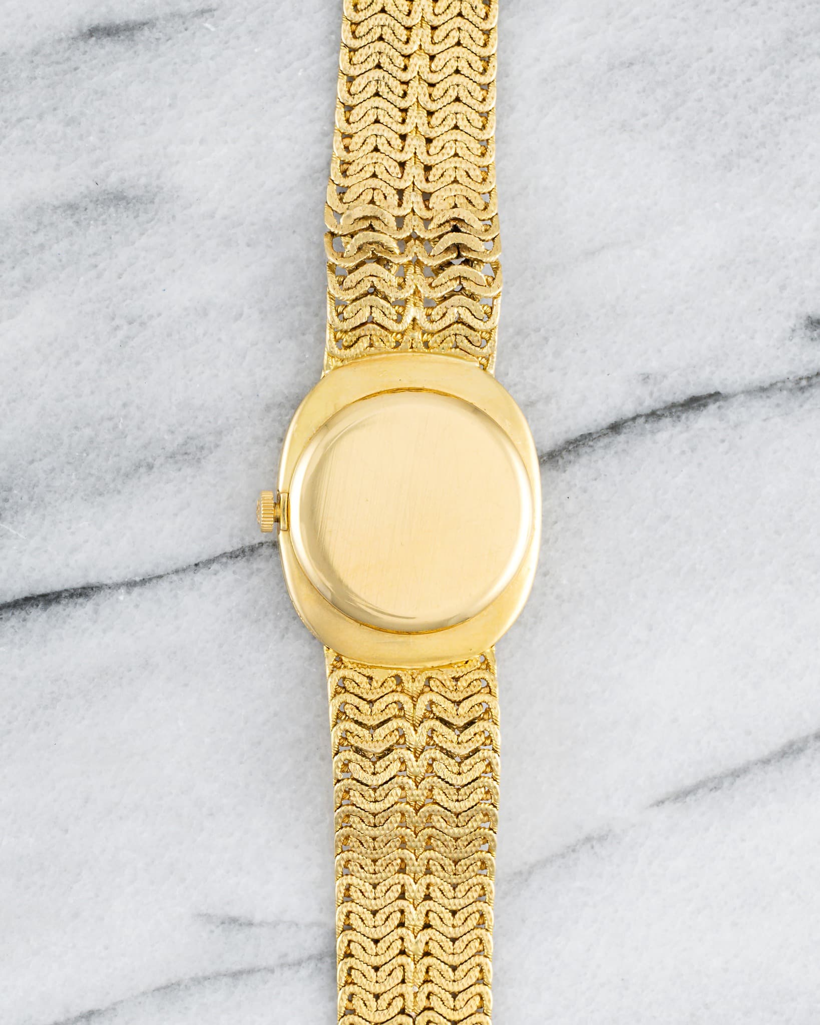 May be an image of jewelry and wrist watch
