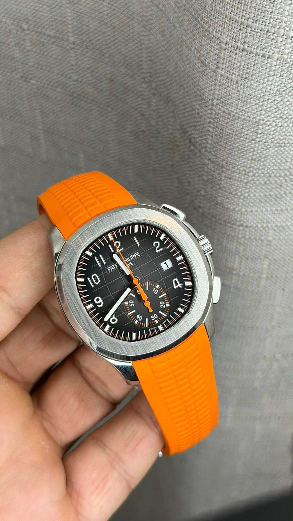 May be an image of wrist watch and text
