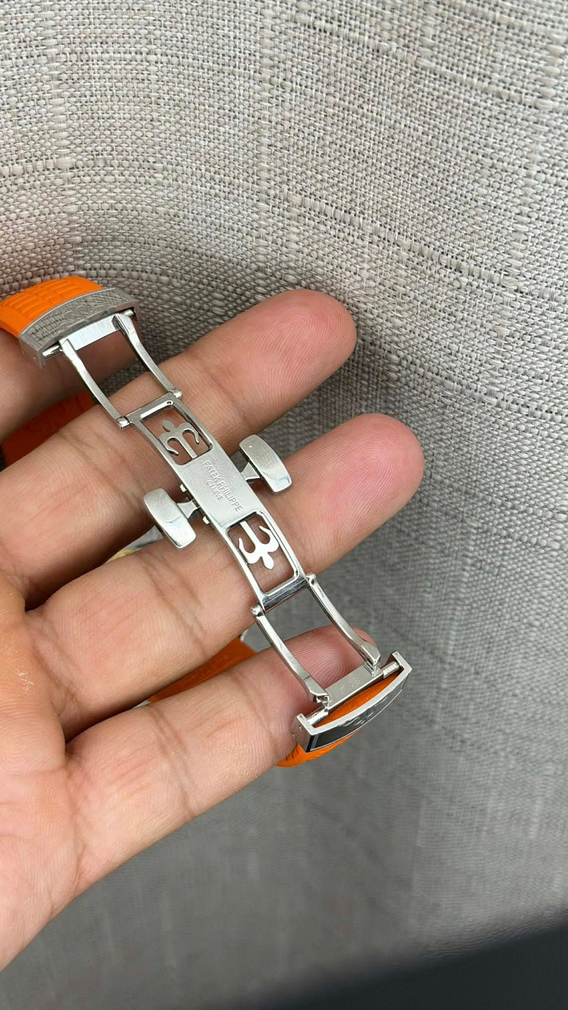 May be an image of wrist watch and text