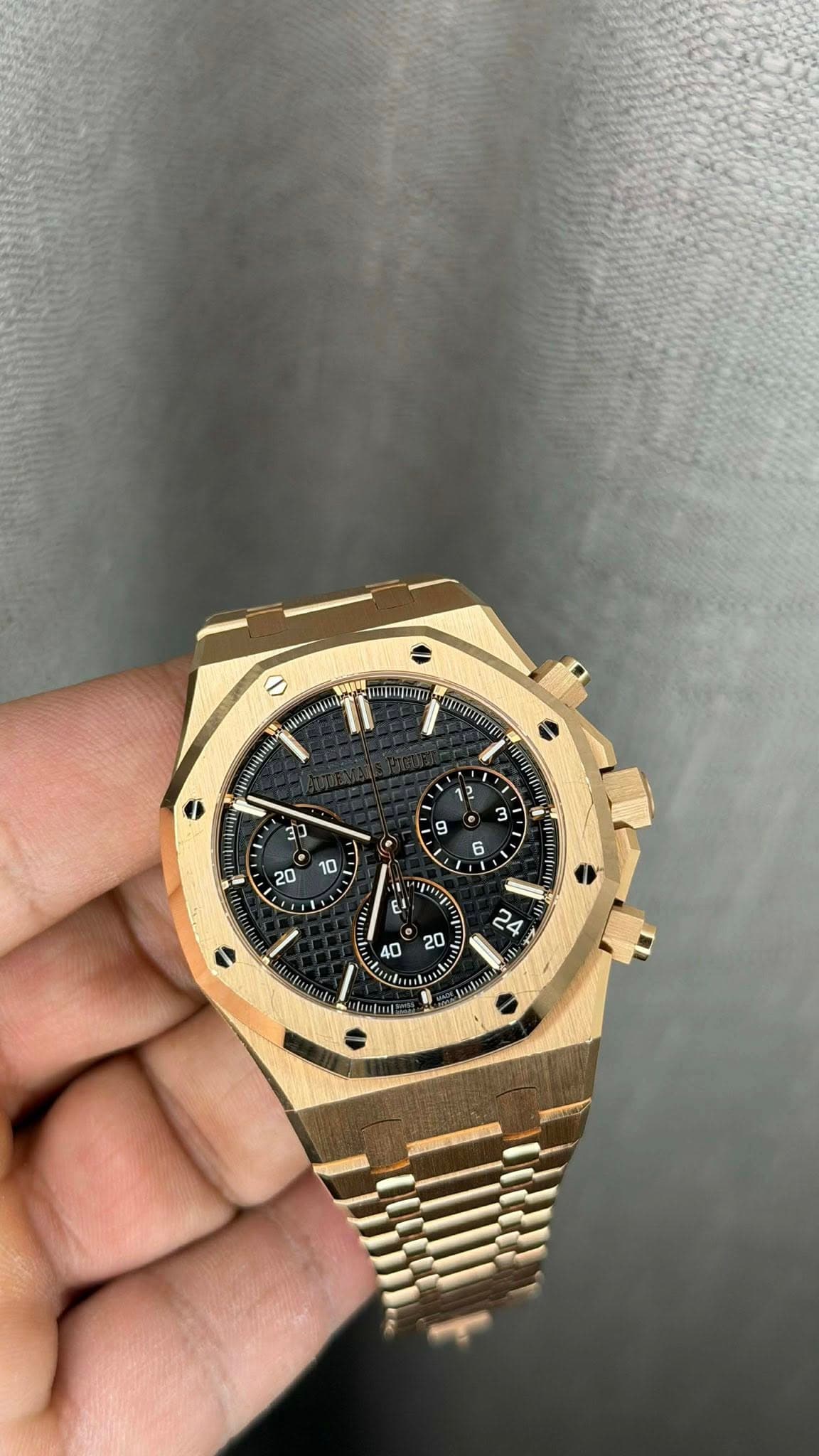May be an image of wrist watch and text