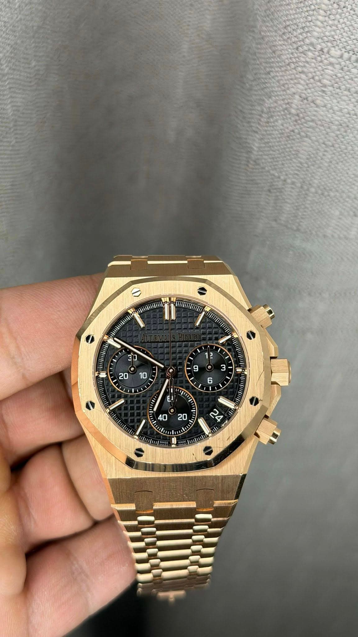 May be an image of wrist watch and text