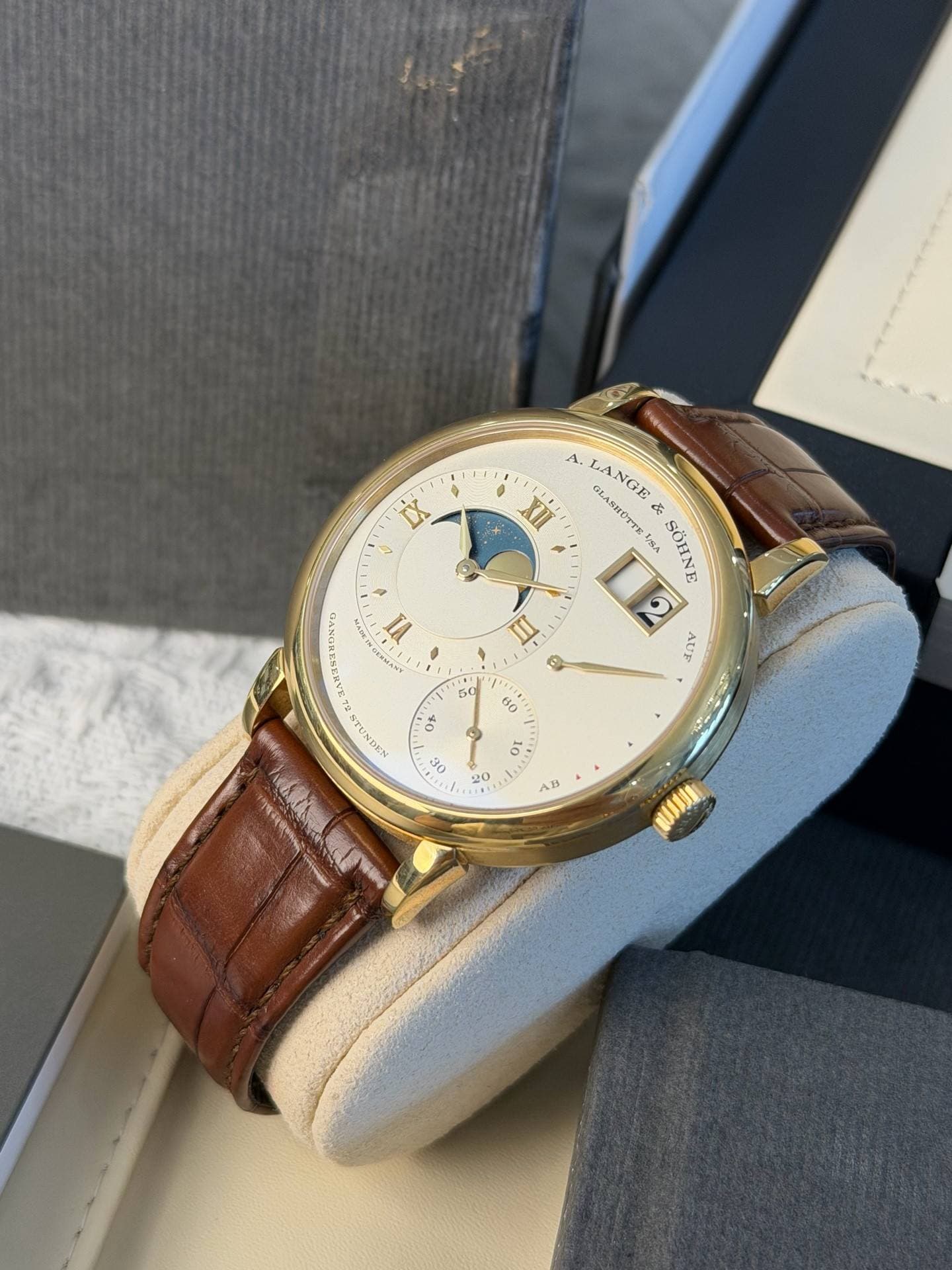 May be an image of wrist watch and text