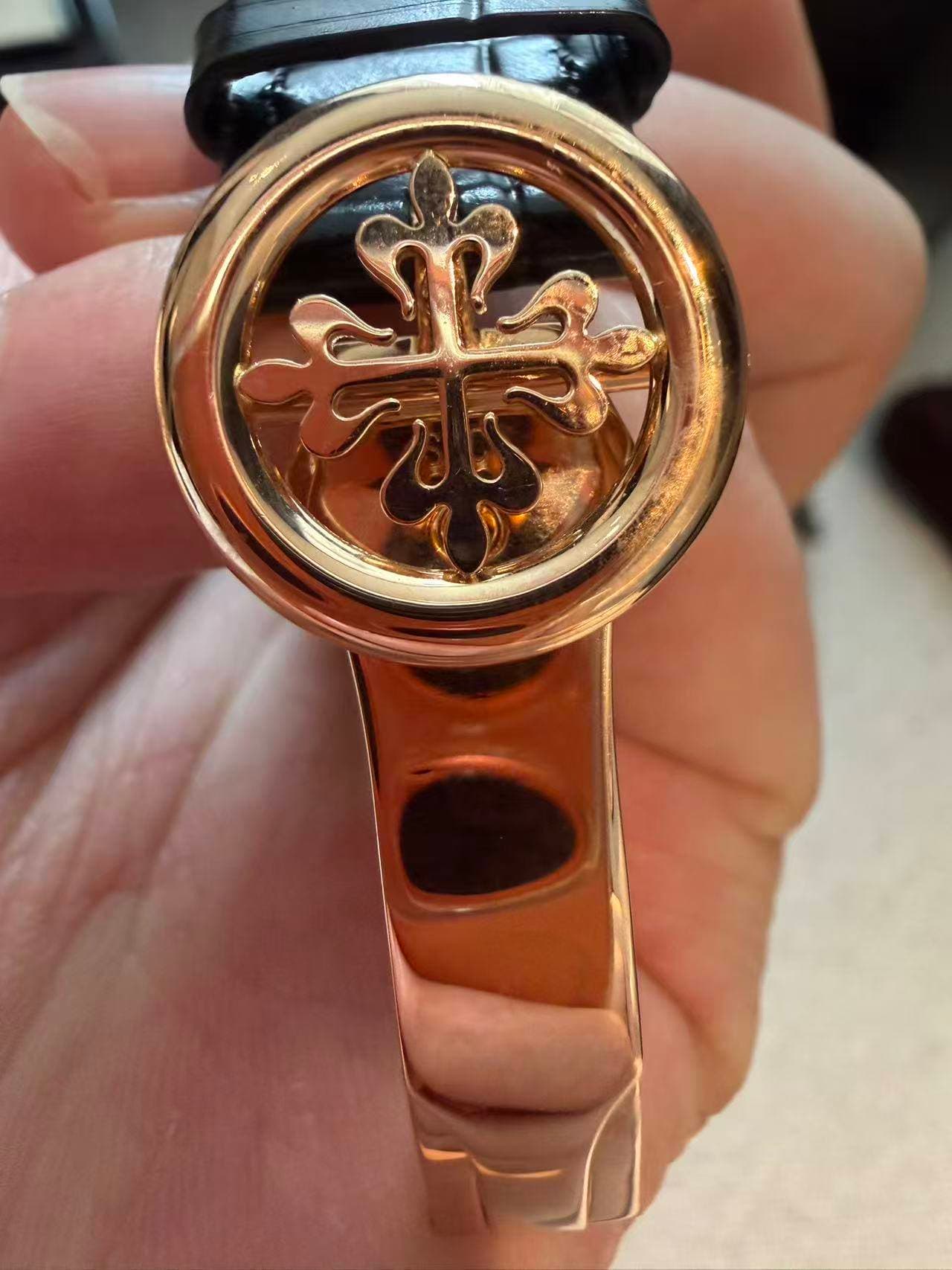 May be an image of wrist watch