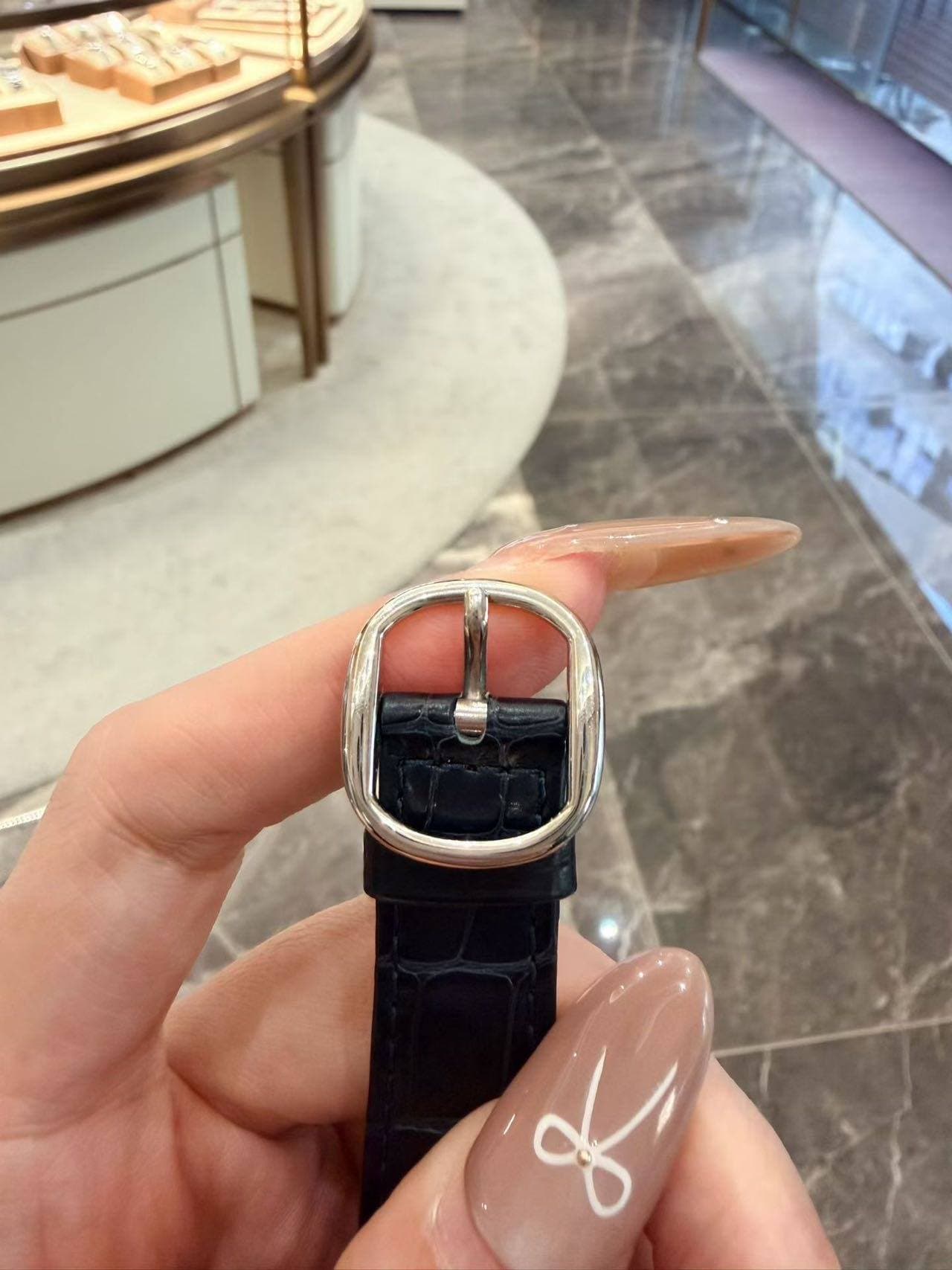 May be an image of wrist watch