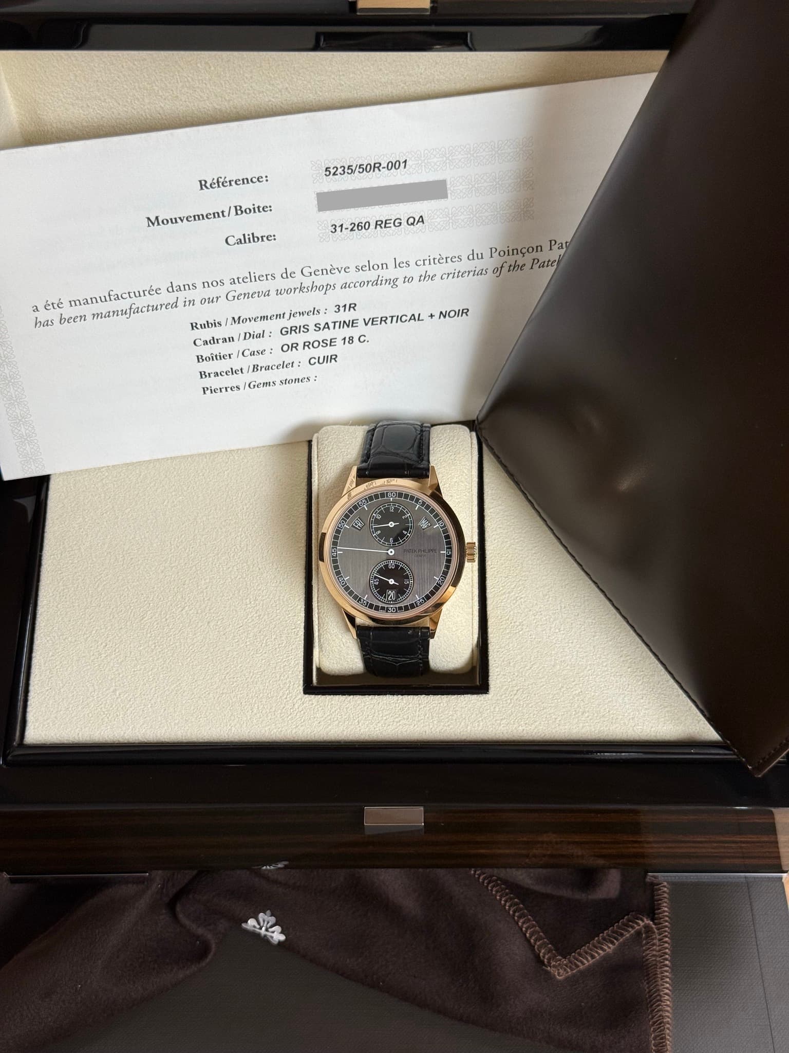 May be an image of wrist watch and text that says '5235/50R-001 Référence: Mouvement/ Boite: Calibre: 31-260 REG QA les critères du Poinçon Pat criterias fthe Pate® dans nos…