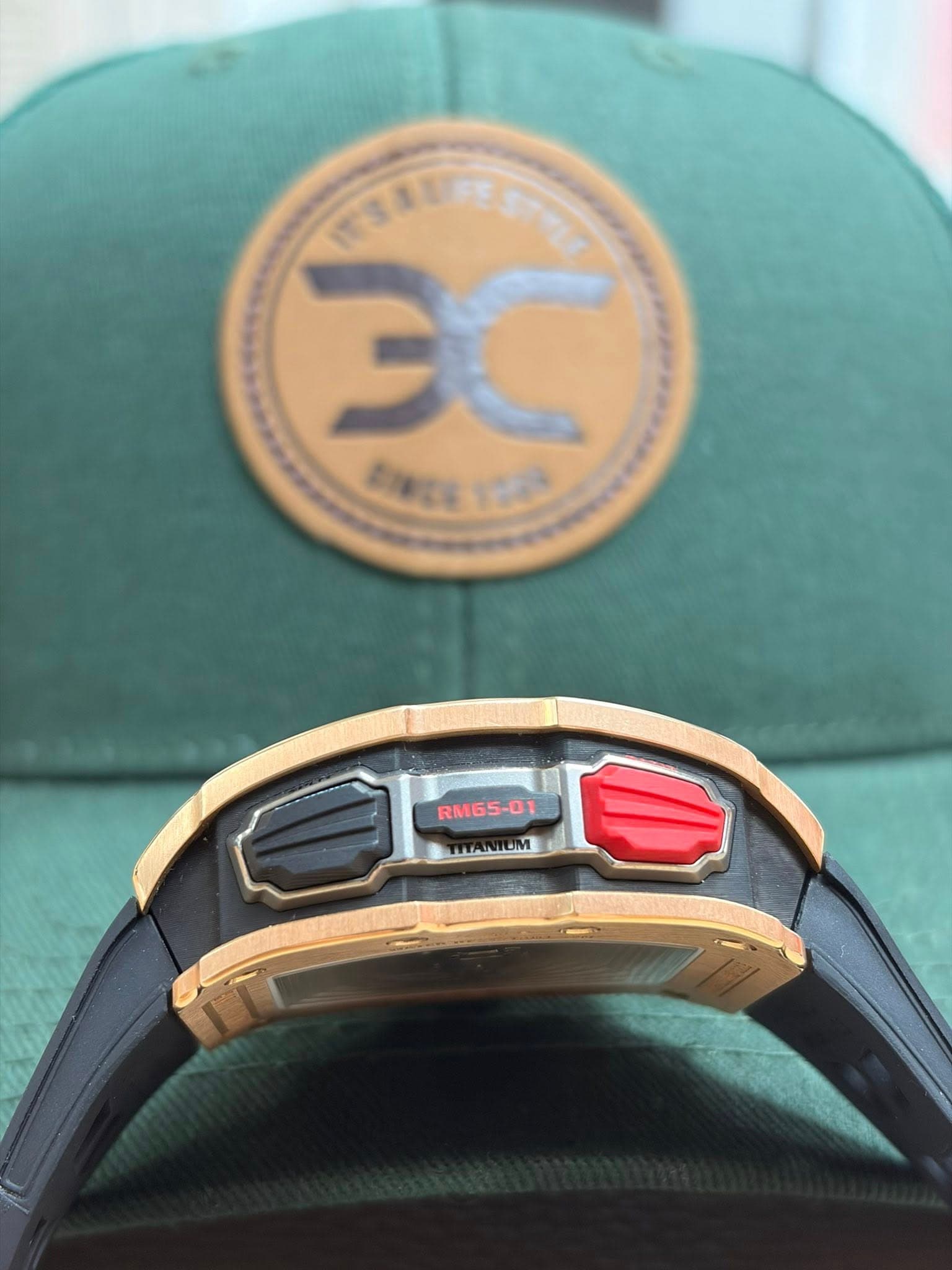 May be an image of hat and text