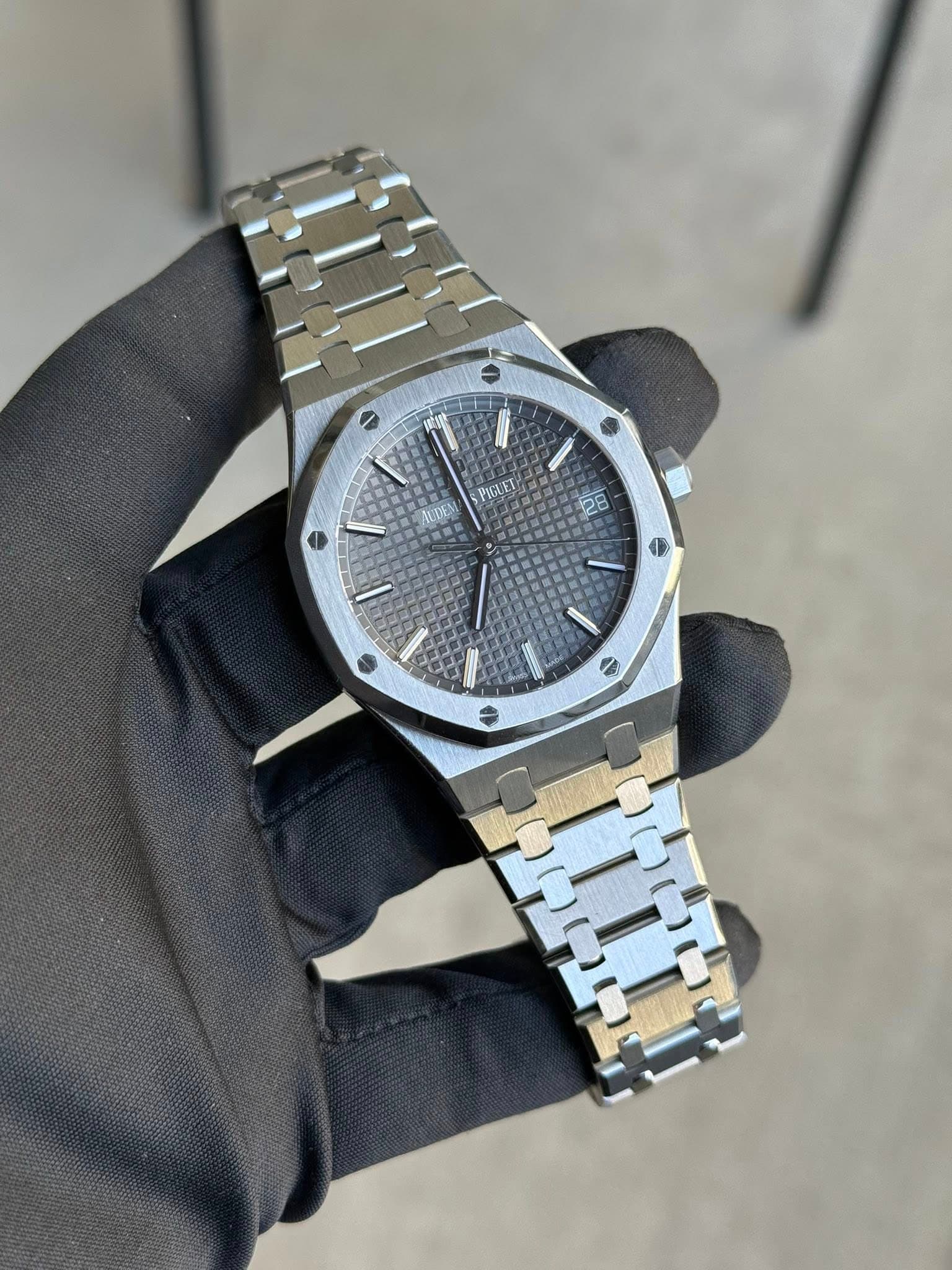 May be an image of wrist watch and text