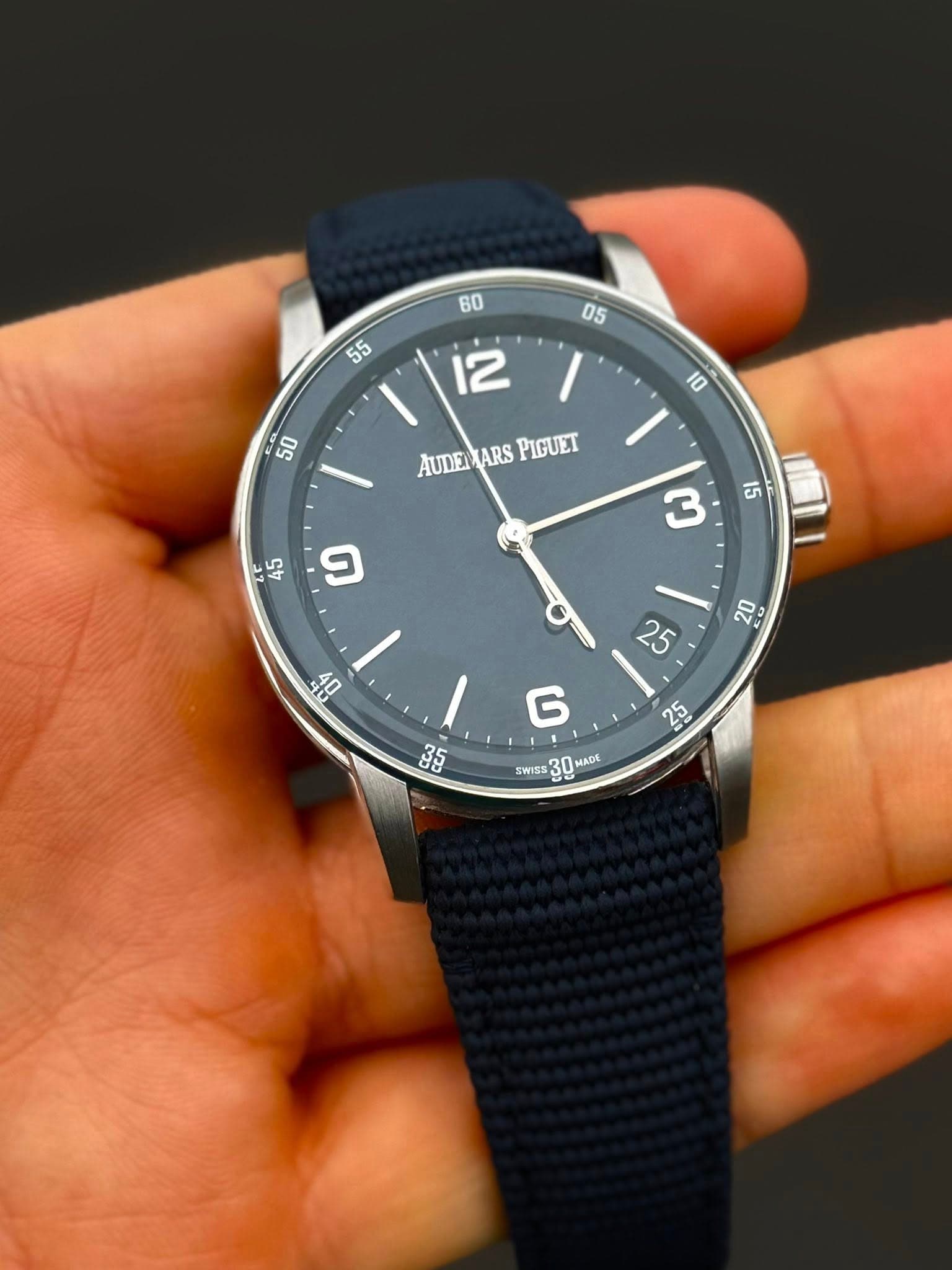 May be an image of wrist watch and text that says ' / 12 AUDEI AUDEMARSPIGUET ARS PIGUET း၅ 55 פ 3 भठ 20 EU 5G 5 G 5יל 25 SWISS 30 MADE'