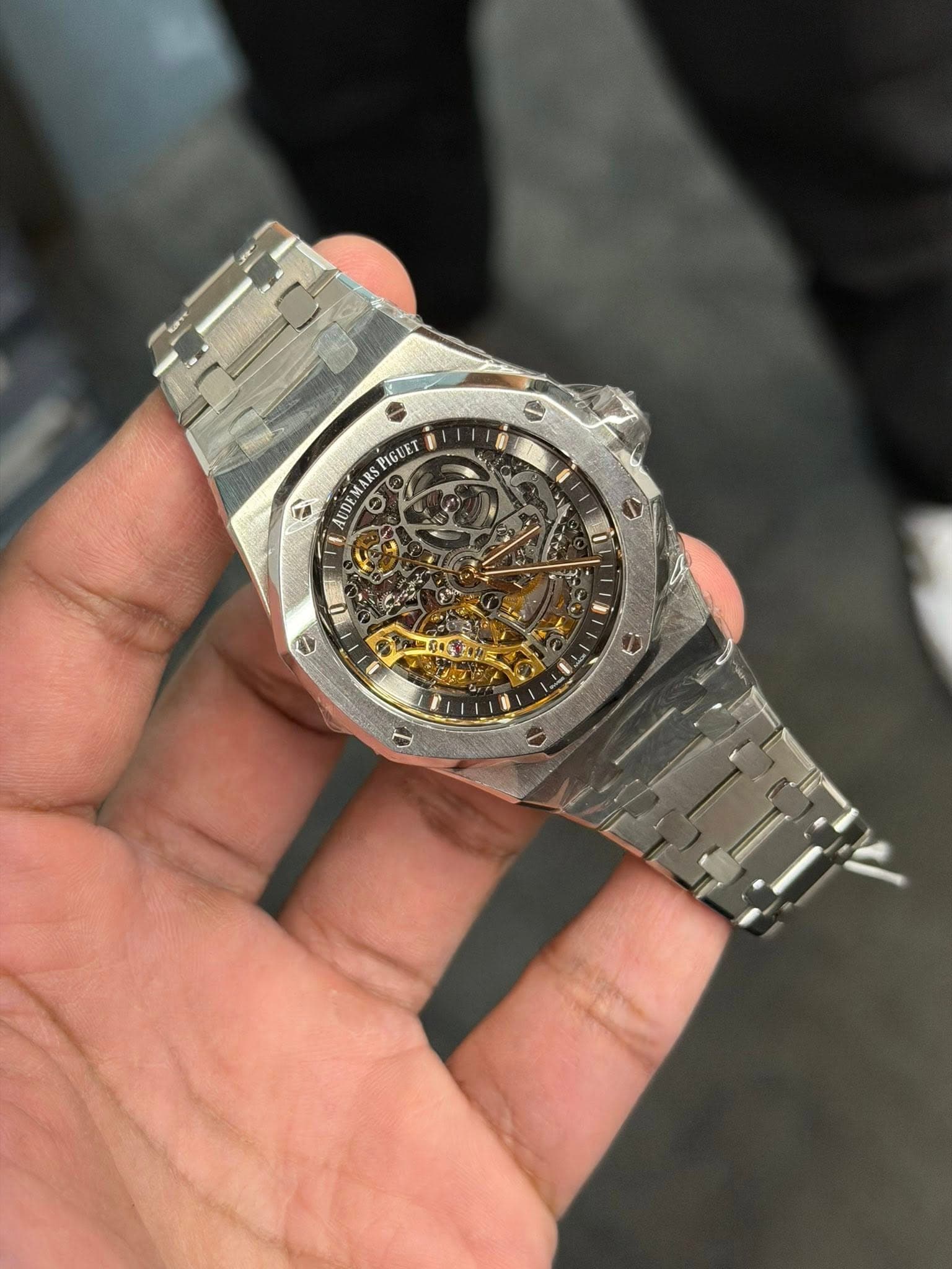 May be an image of wrist watch and text