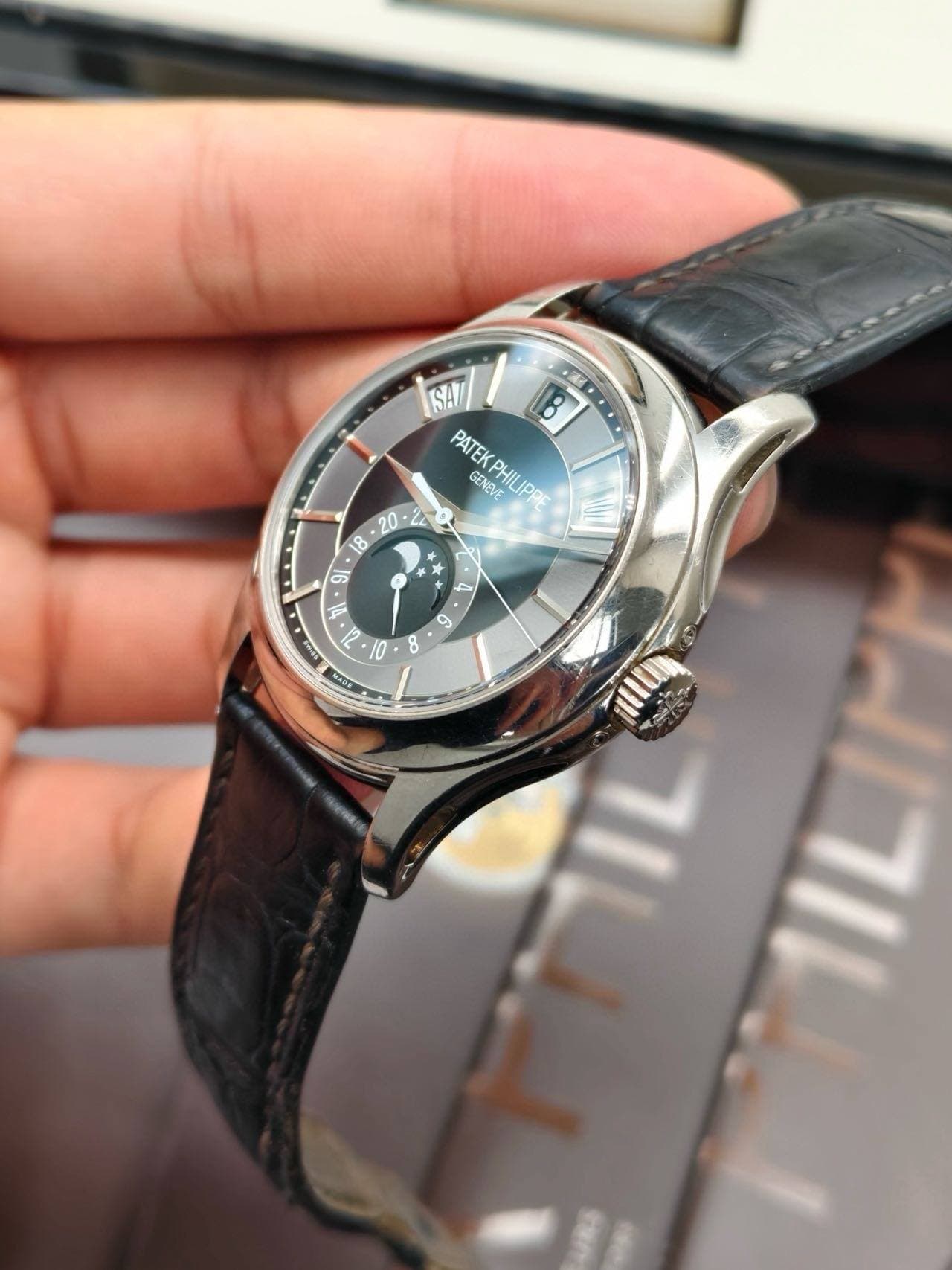 May be an image of wrist watch and text that says 'SAT ,富 8 PATEK GENEVE PHII PHILIPPI 水 A * x M A C 6 21 10 P 8 ن ان GADE "..0 B T0 E o'