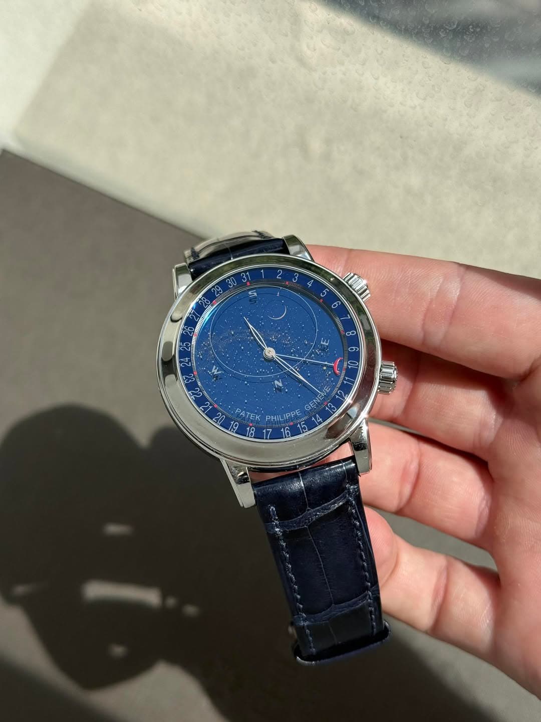 May be an image of digital watch and text