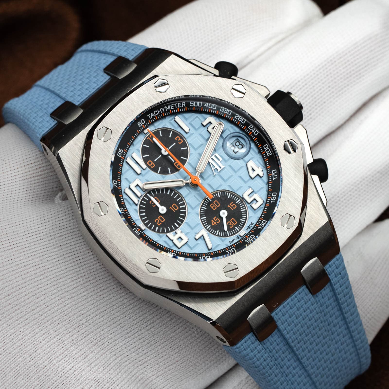 May be an image of wrist watch and text