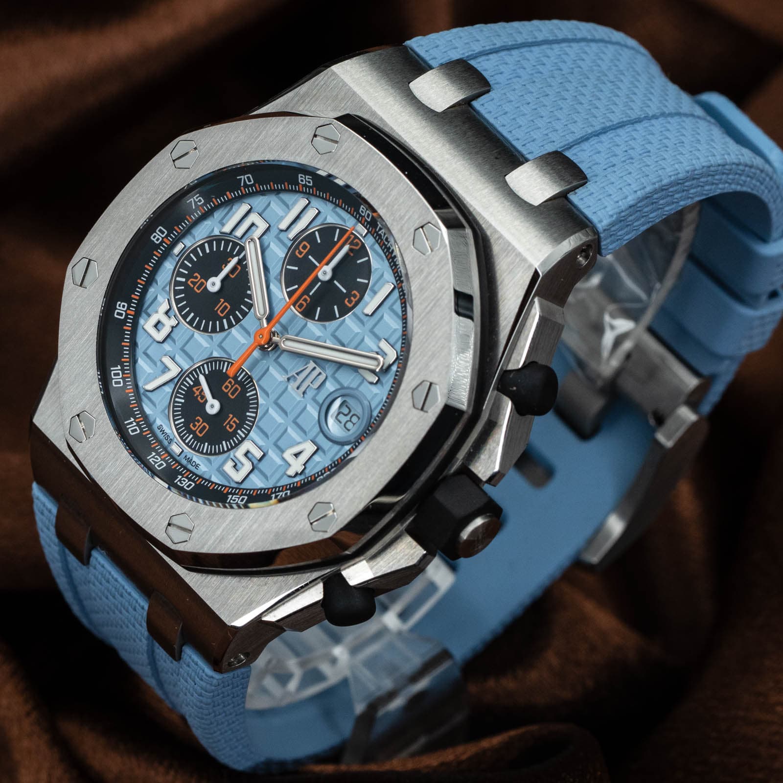 May be an image of wrist watch and text