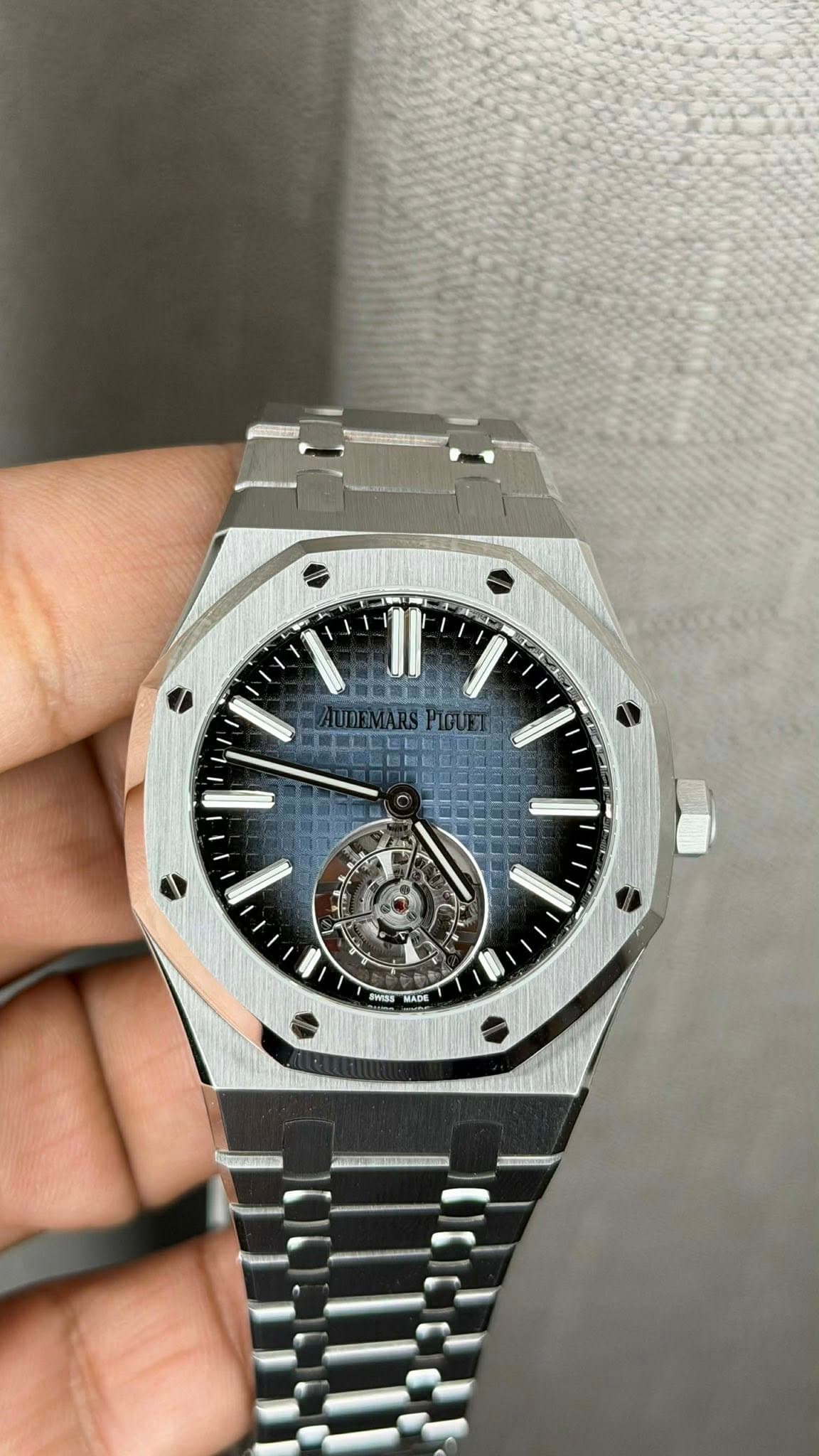 May be an image of wrist watch and text