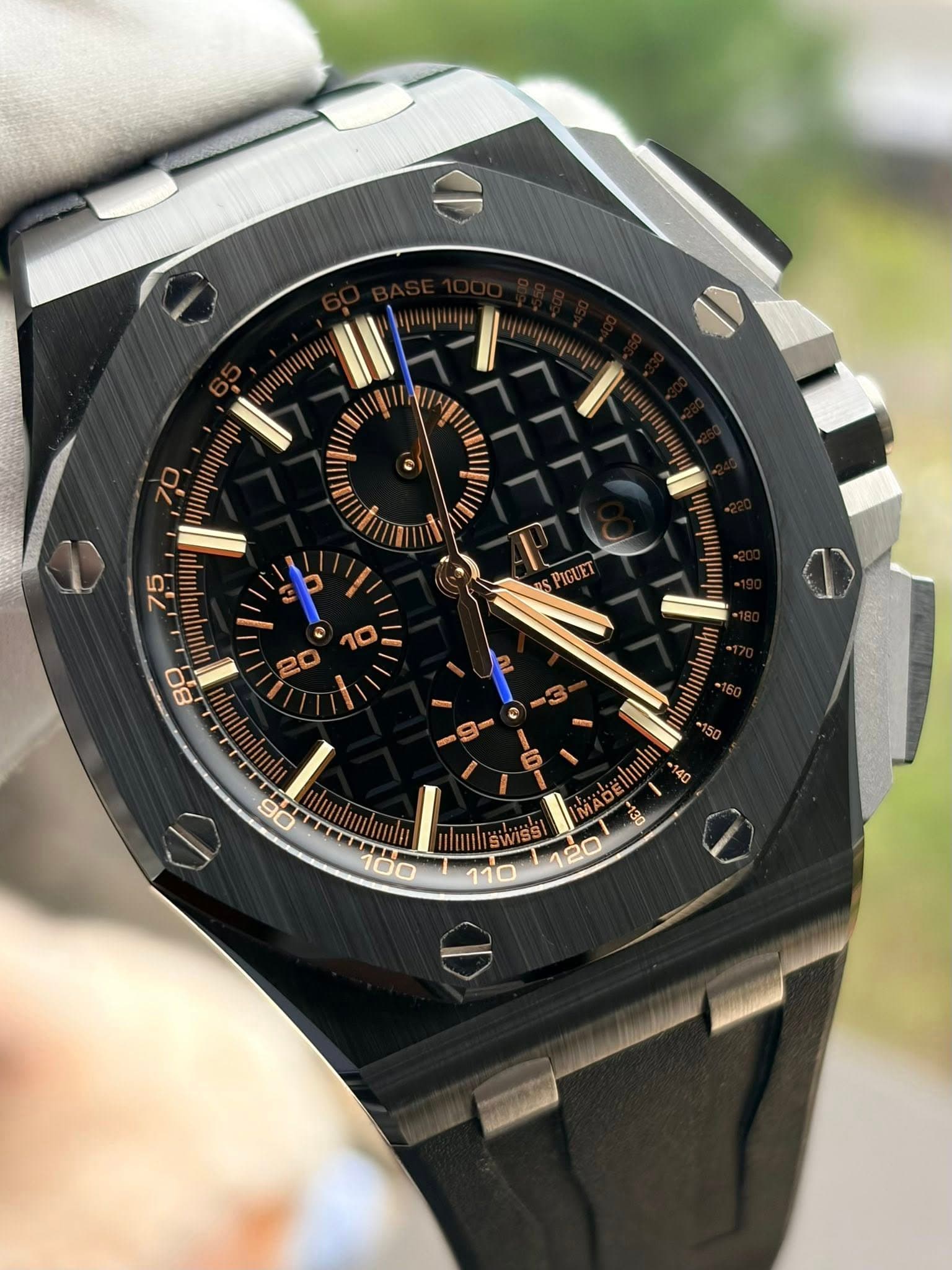 May be an image of wrist watch and text