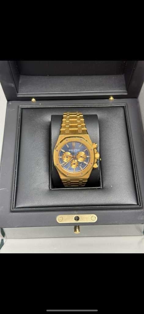 May be an image of wrist watch