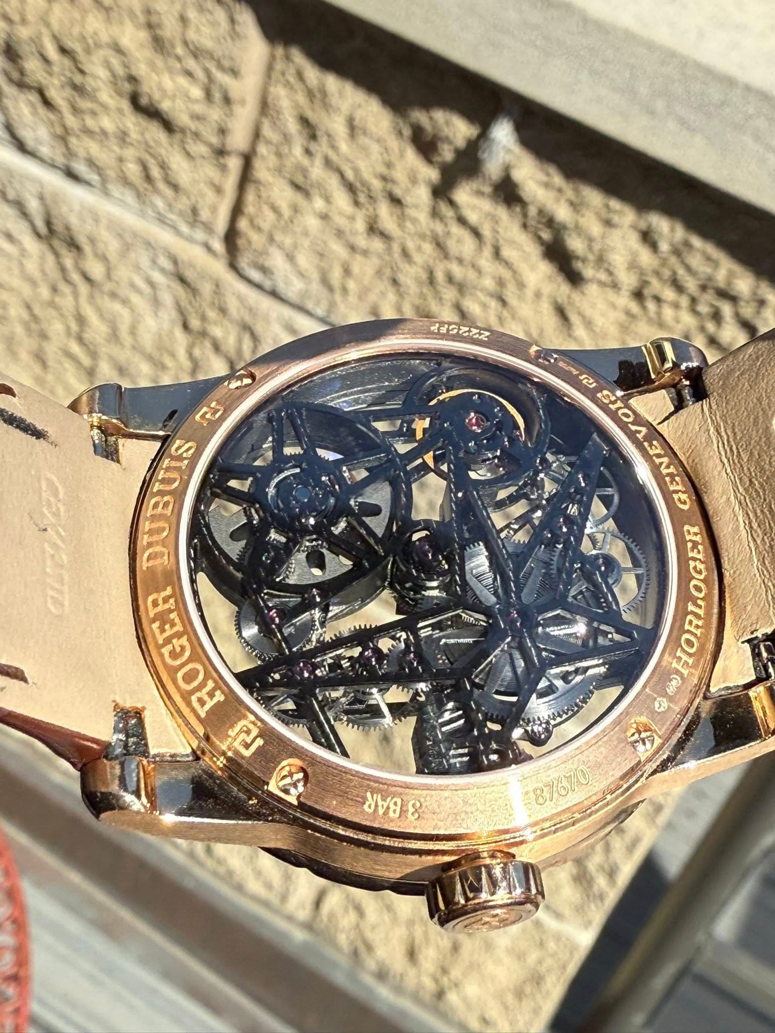 May be an image of wrist watch and text