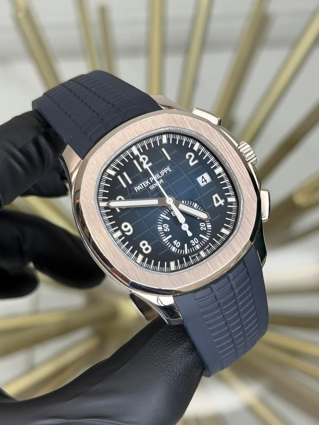 May be an image of wrist watch and text that says 'μ,μμиyμ I นนท I 12 ល 'ር I1 ILIPPE PATEK GEN PATEKPHILIPPE VE E EN A и 6 שיין H 6 S 50 8 20 0S I00 4 n መ! 40 0 O 三'