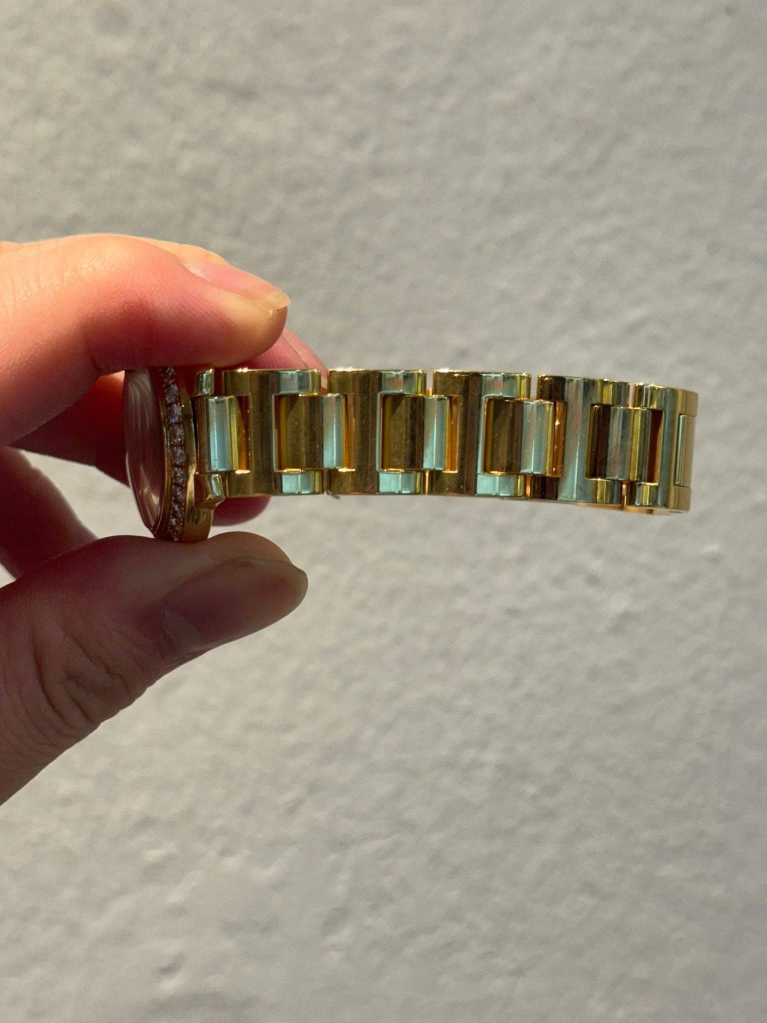 May be an image of wrist watch