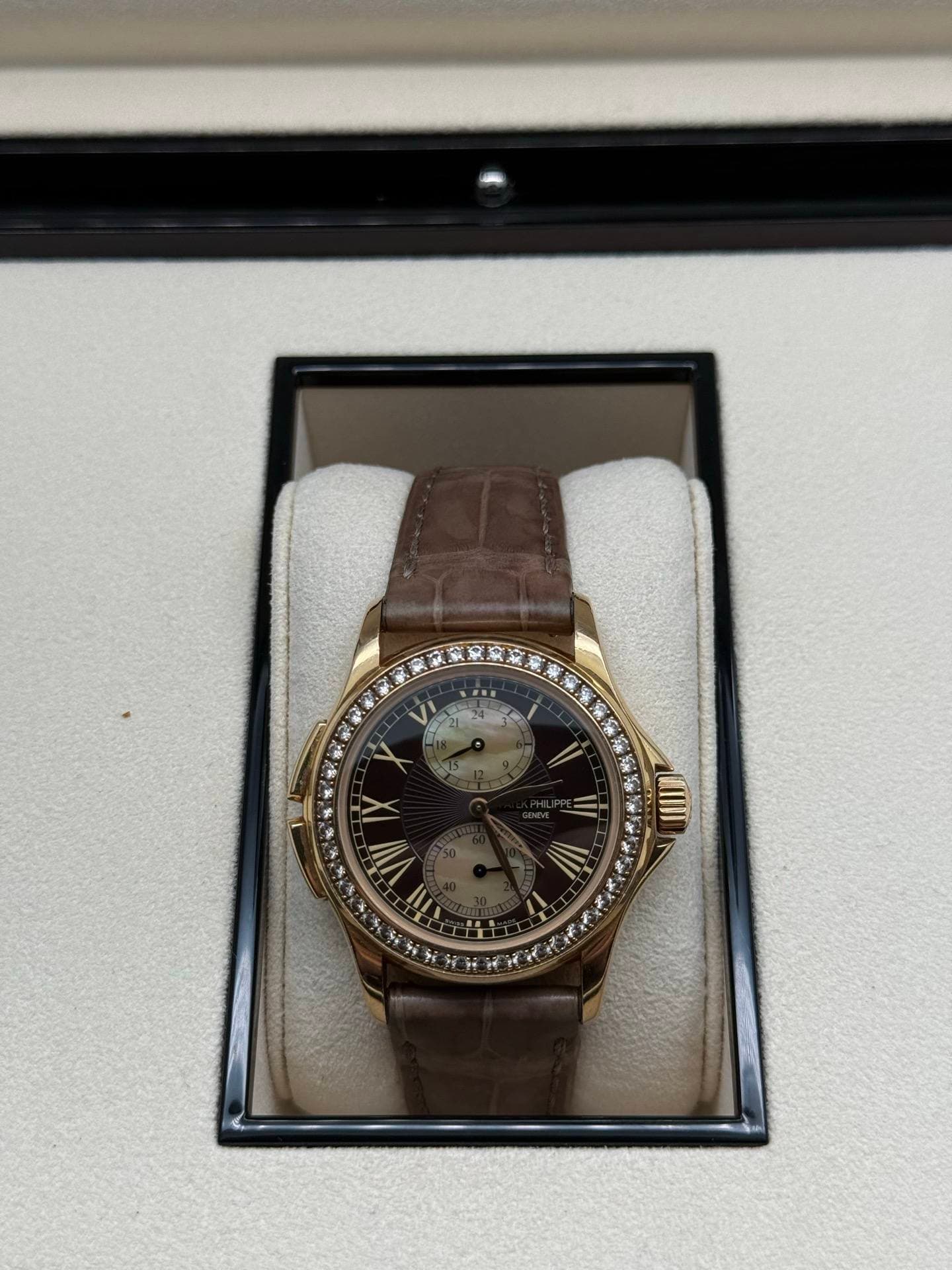 May be an image of wrist watch and text