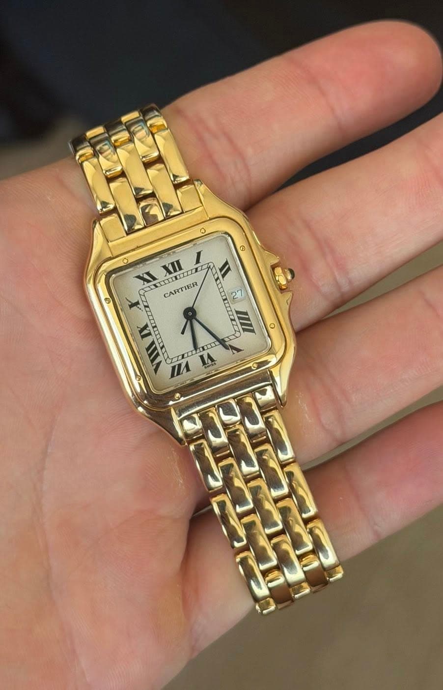 May be an image of digital watch and text