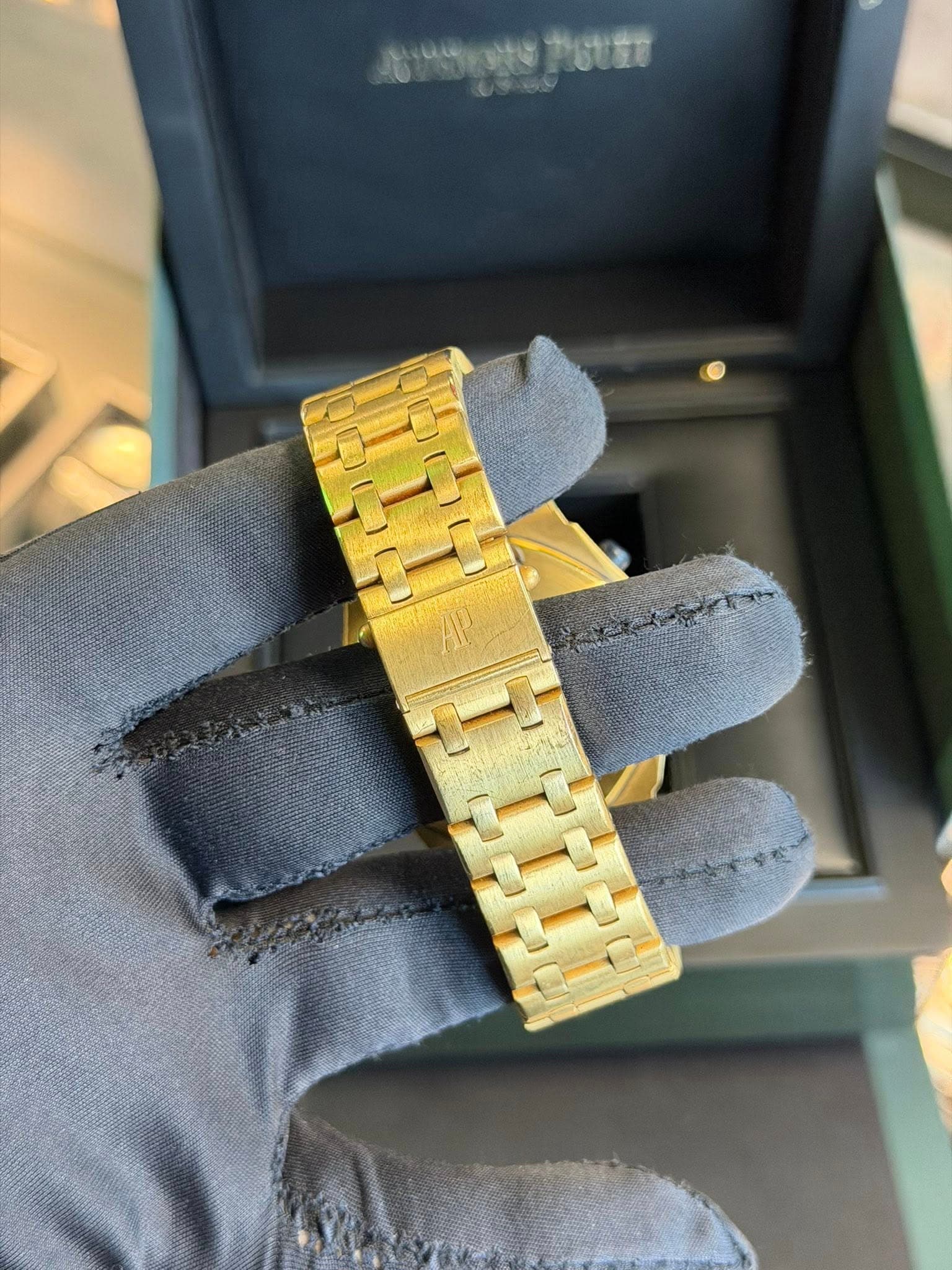 May be an image of wrist watch and text