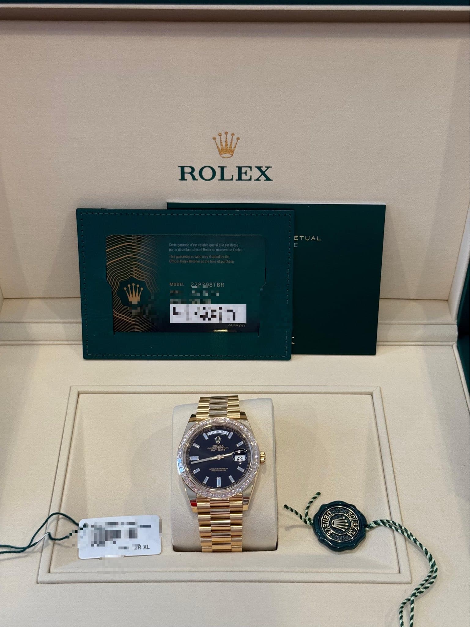 May be an image of wrist watch and text