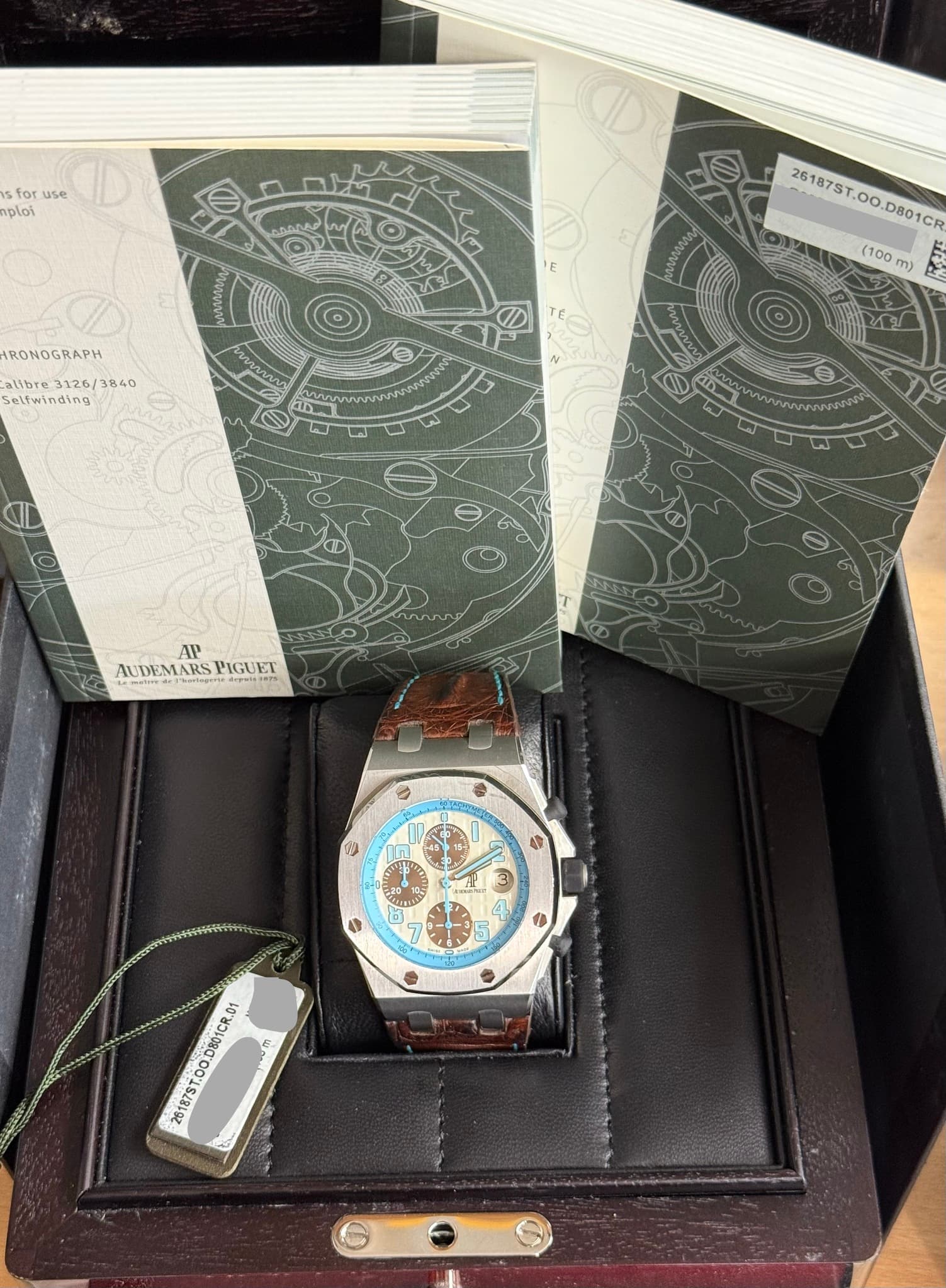 May be an image of digital watch, map and text that says 'Is for use ploi معحي E RONOGRAPH alibre libre3120/38 3120/ 120/ Selfwinding 261875T.00 .D80 26187ST.00.D801CR CR (100…