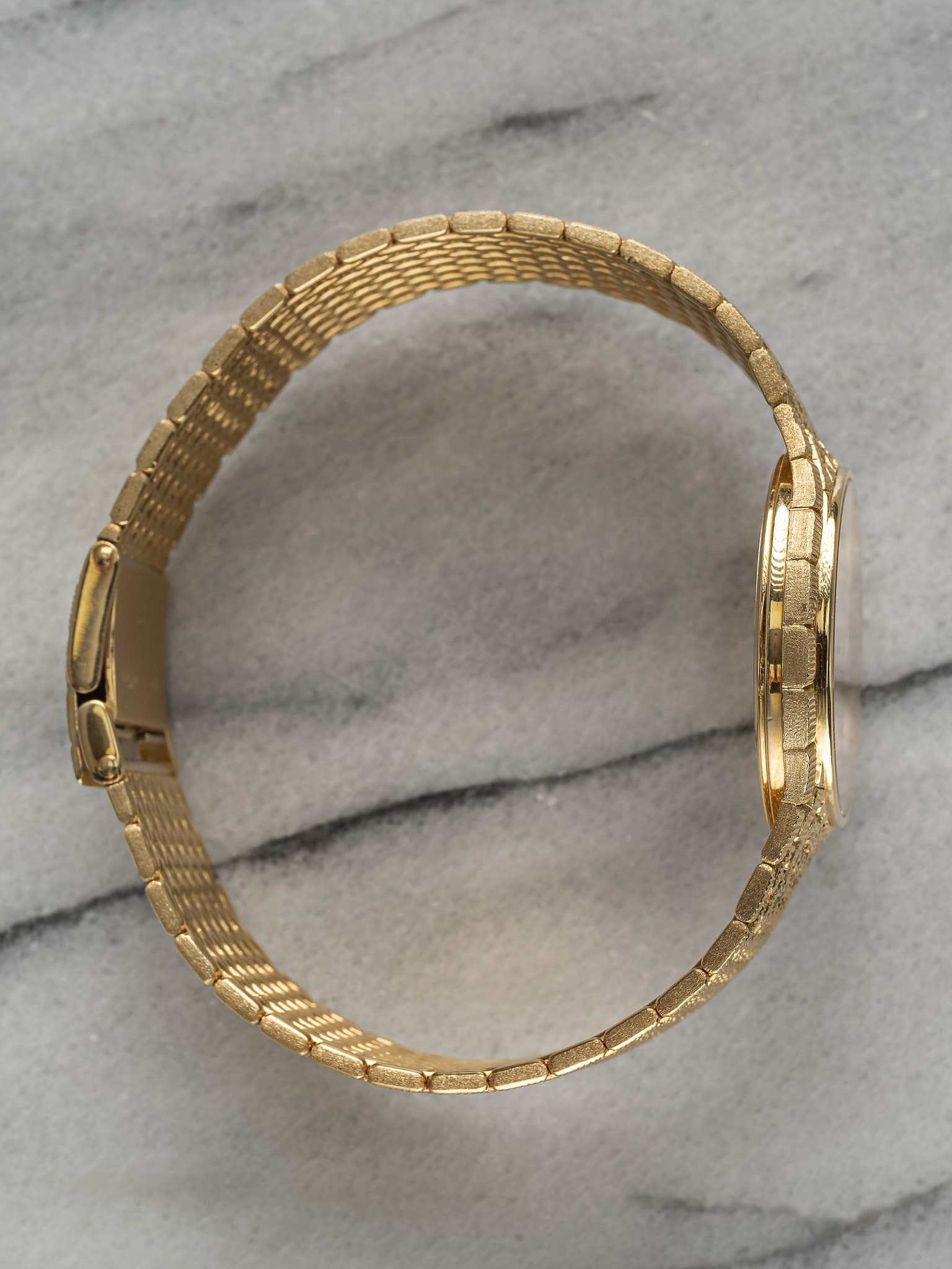 May be an image of brass and jewelry