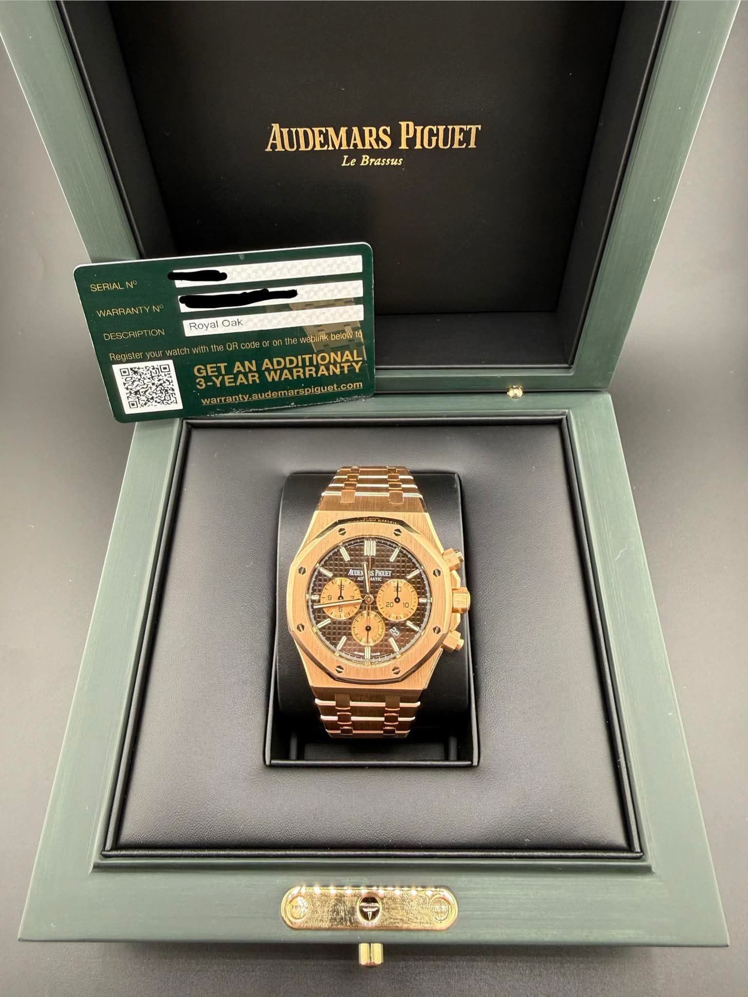 May be an image of wrist watch and text that says 'AUDEMARS AUDEMARSPIGUET Le Brassus PIGUET SERIAL WARRANT RoyalOak Royai Oak dbicak DEION GET -YEARWARRANTY piguet.com comโฆ