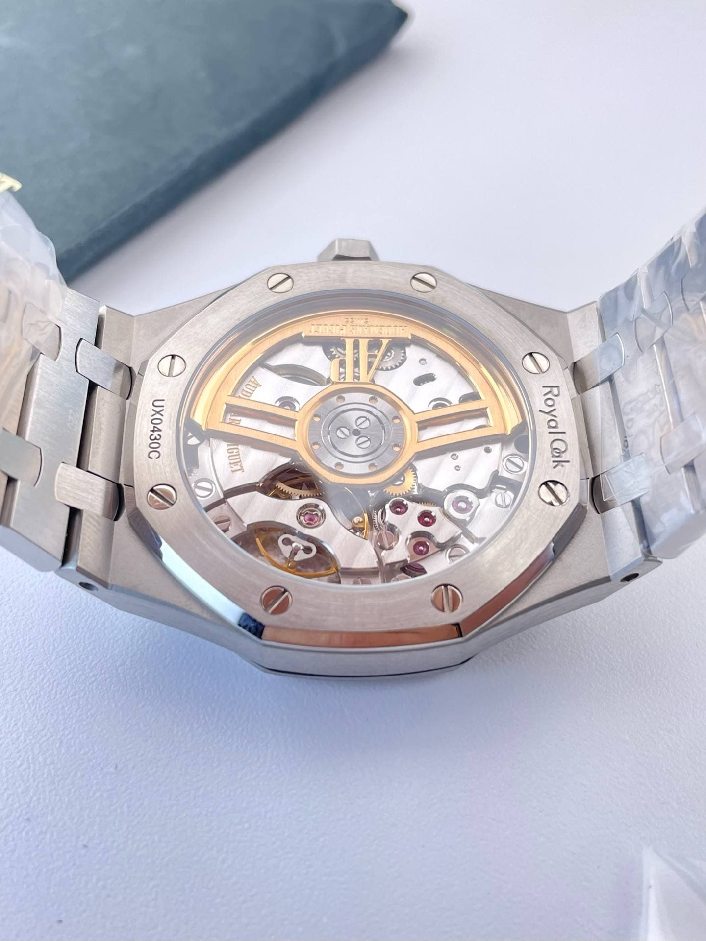 May be an image of wrist watch and text