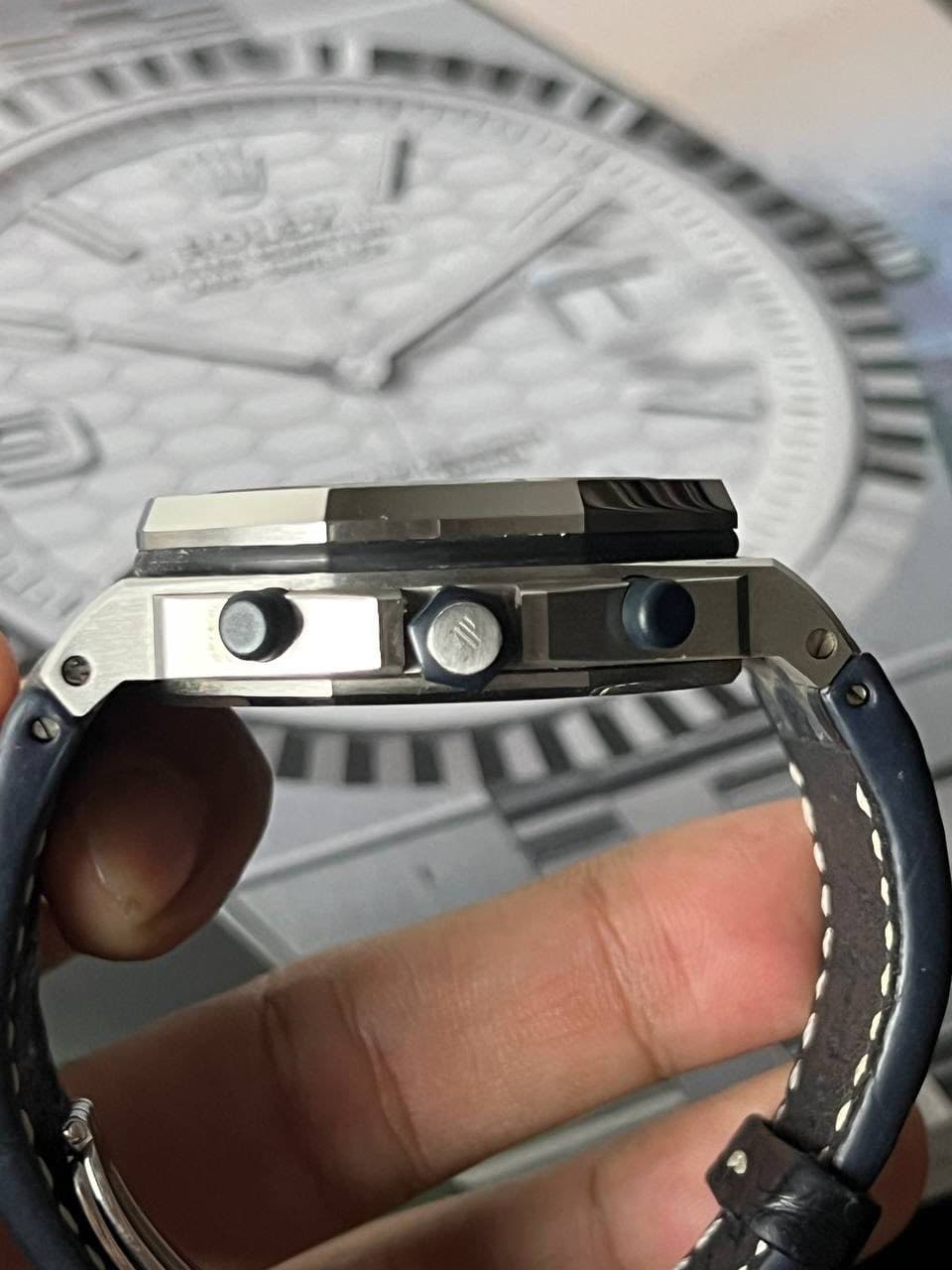 May be an image of wrist watch