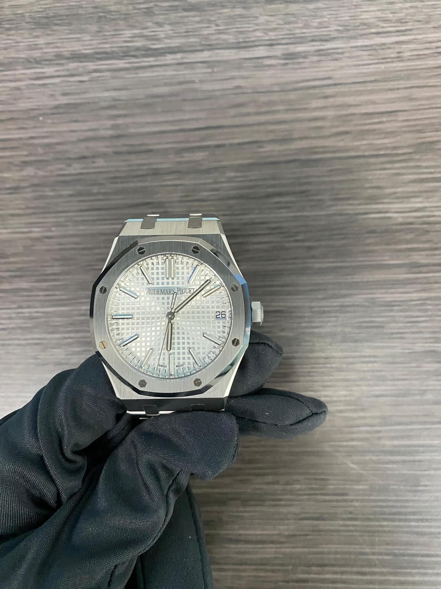 May be an image of wrist watch and text